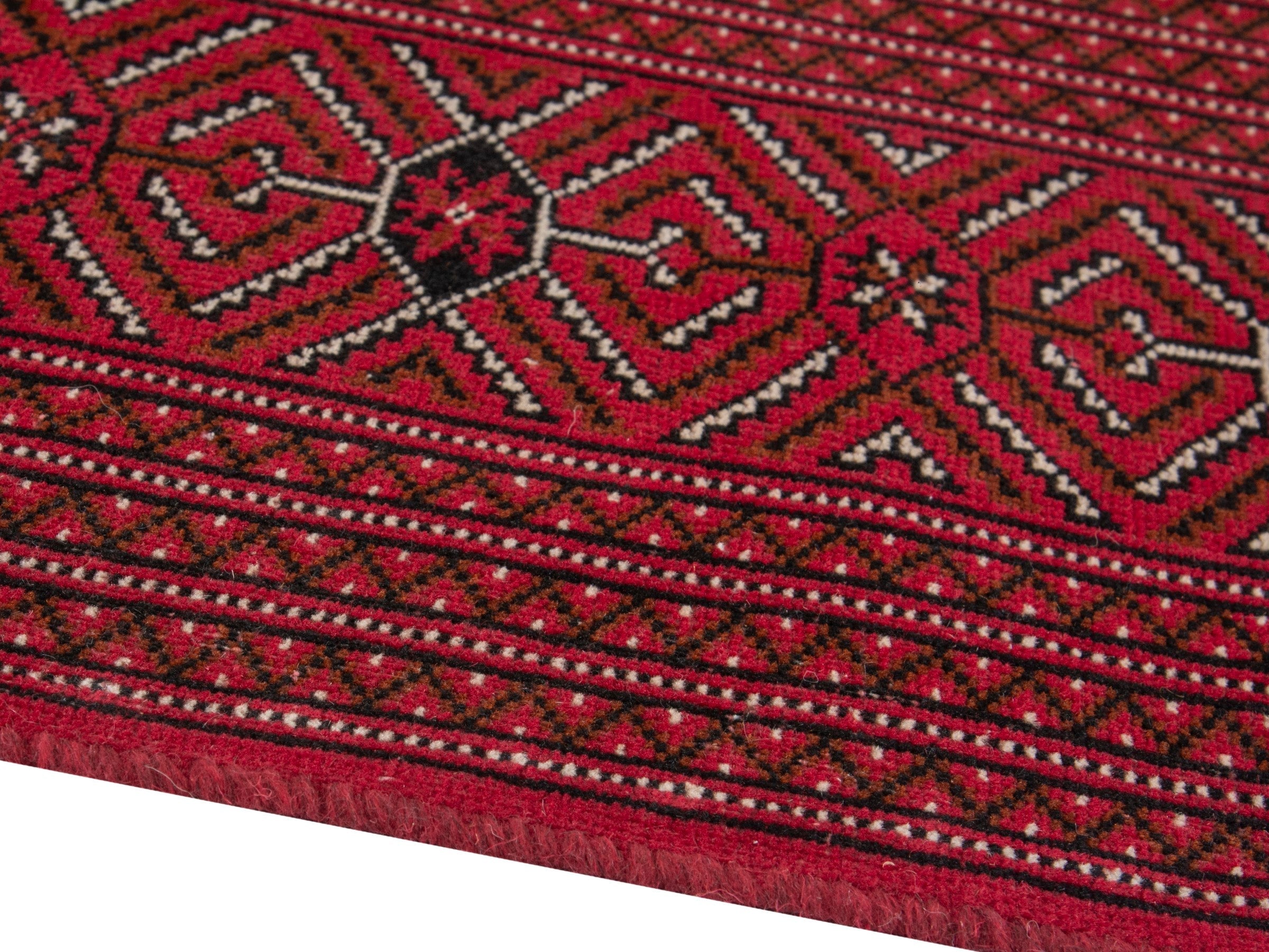 Persian Torkaman oversized rug in deep red and antique gold, view 6 of 19