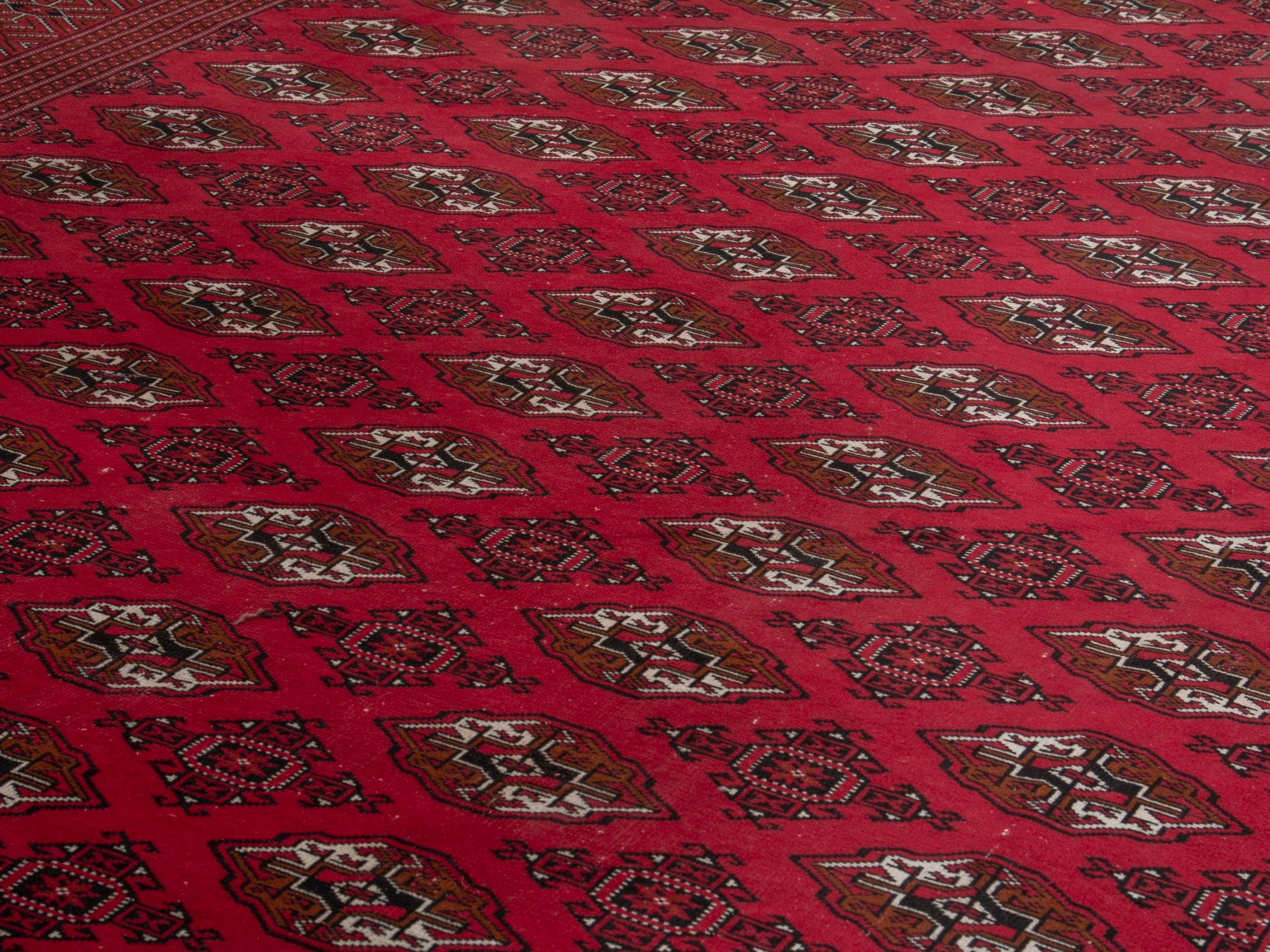 Persian Torkaman oversized rug in deep red and antique gold, view 7 of 19