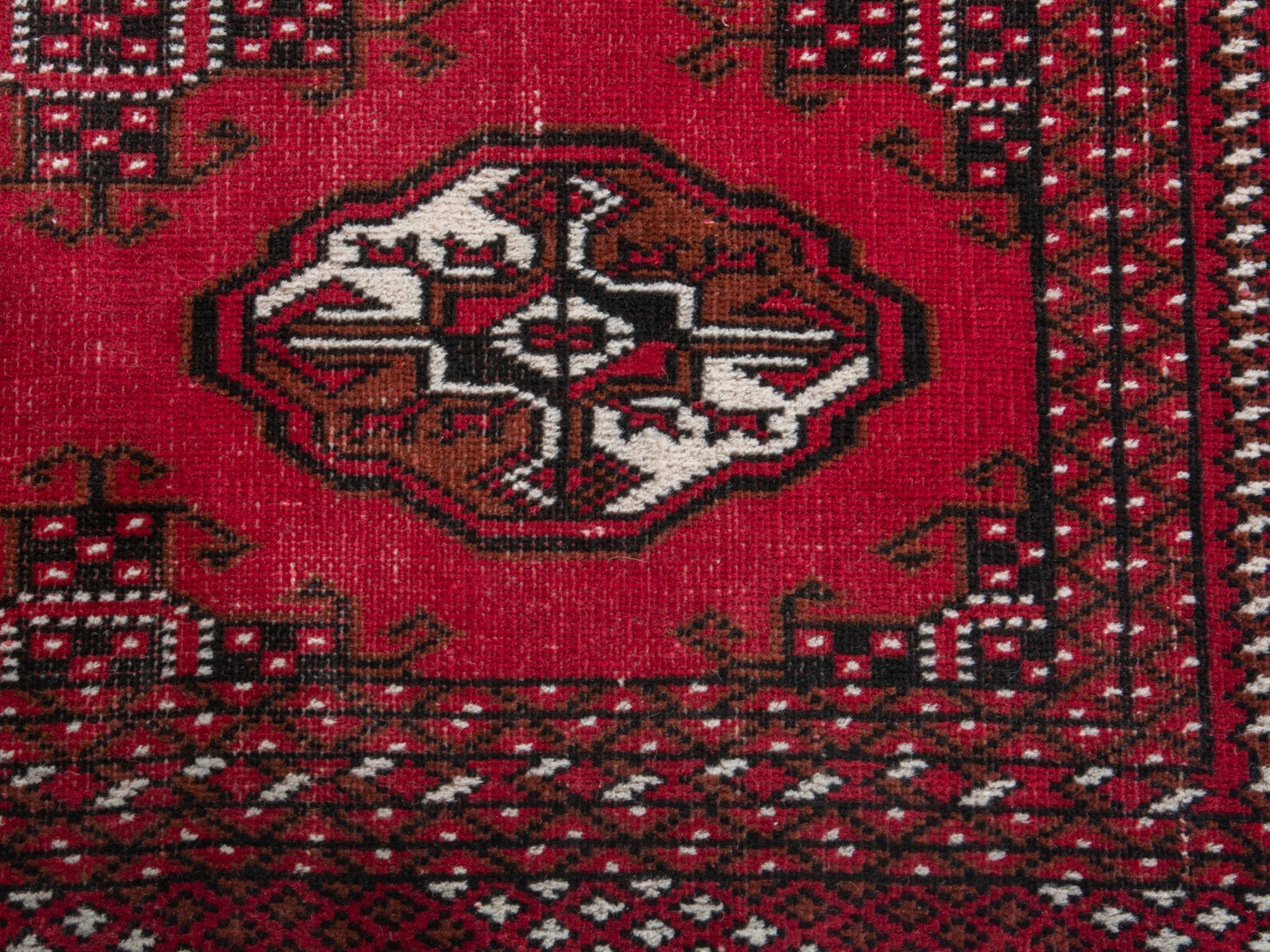 Persian Torkaman accent rug in burgundy and cream, view 11 of 17