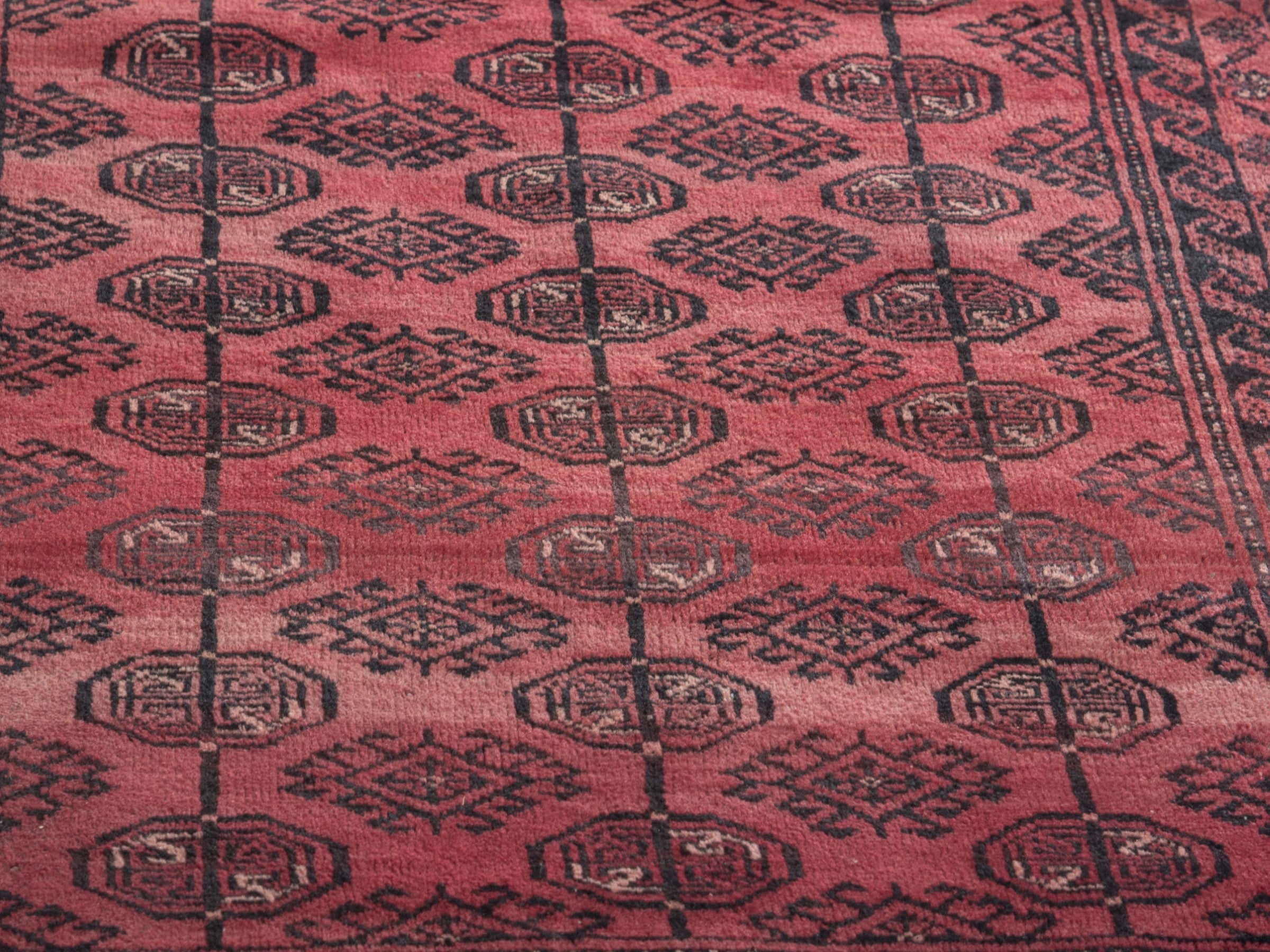 Persian Baluch runner rug in faded red and burgundy, view 8 of 18