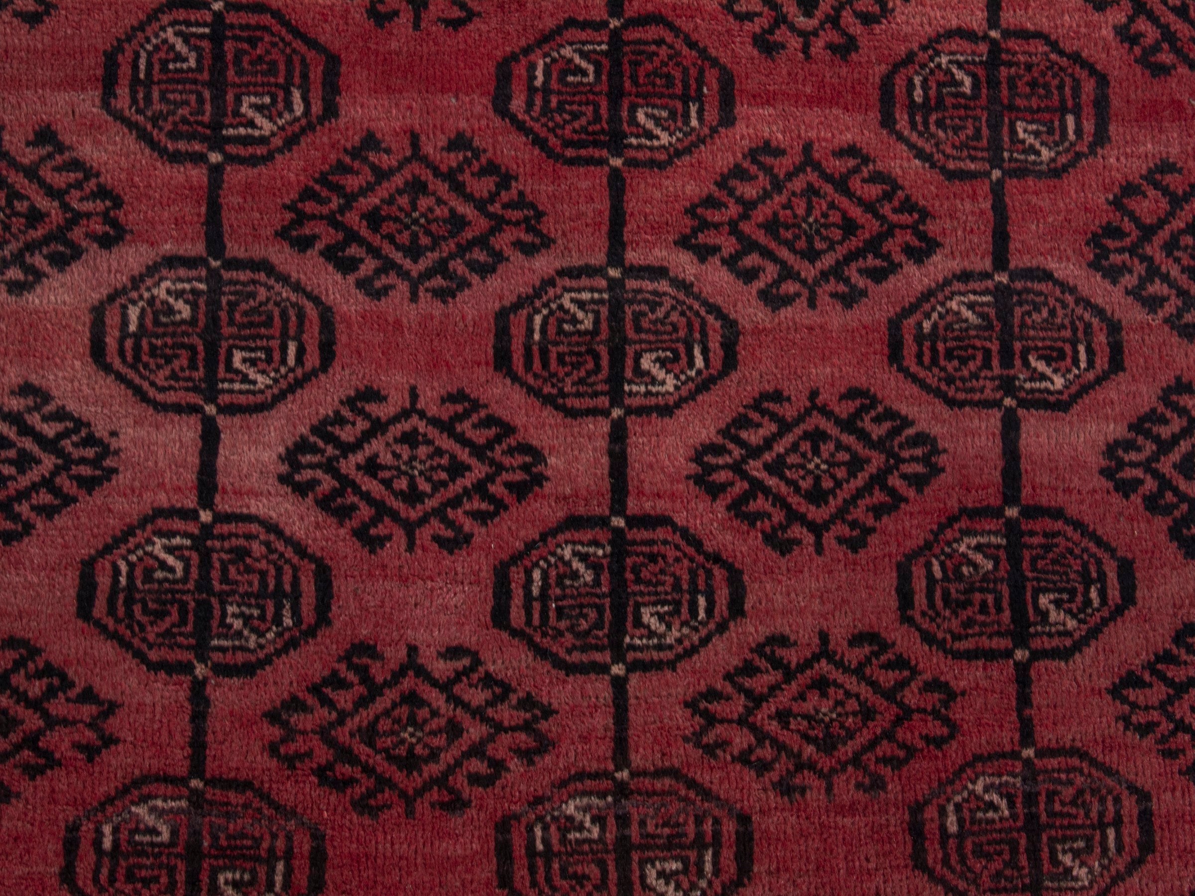 Persian Baluch runner rug in faded red and burgundy, view 12 of 18