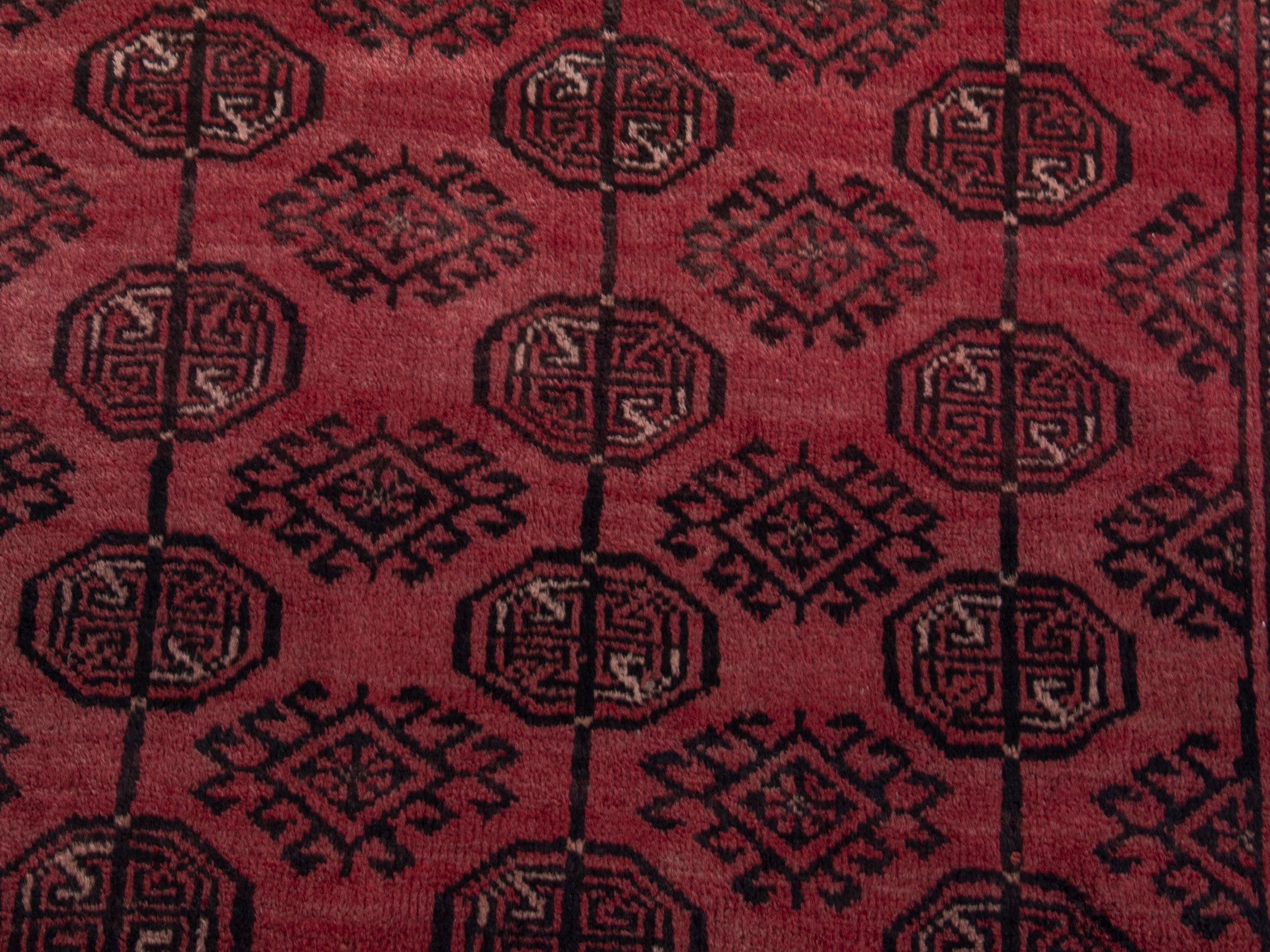 Persian Baluch runner rug in faded red and burgundy, view 13 of 18