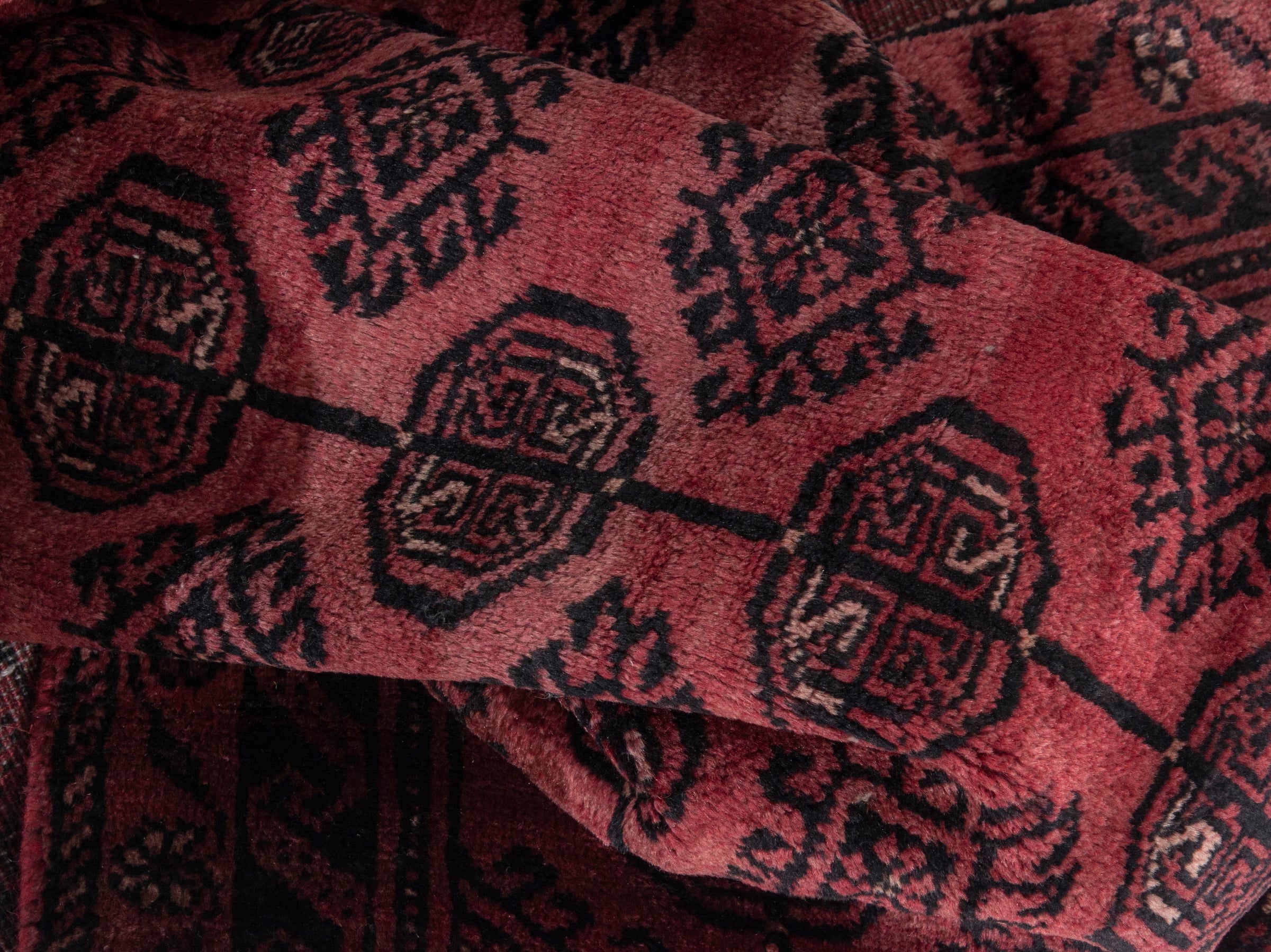 Persian Baluch runner rug in faded red and burgundy, view 15 of 18