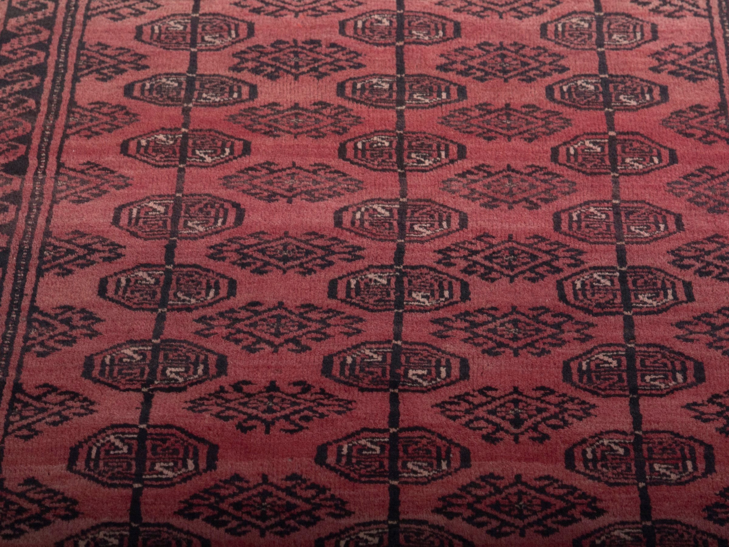 Persian Baluch runner rug in faded red and burgundy, view 7 of 18