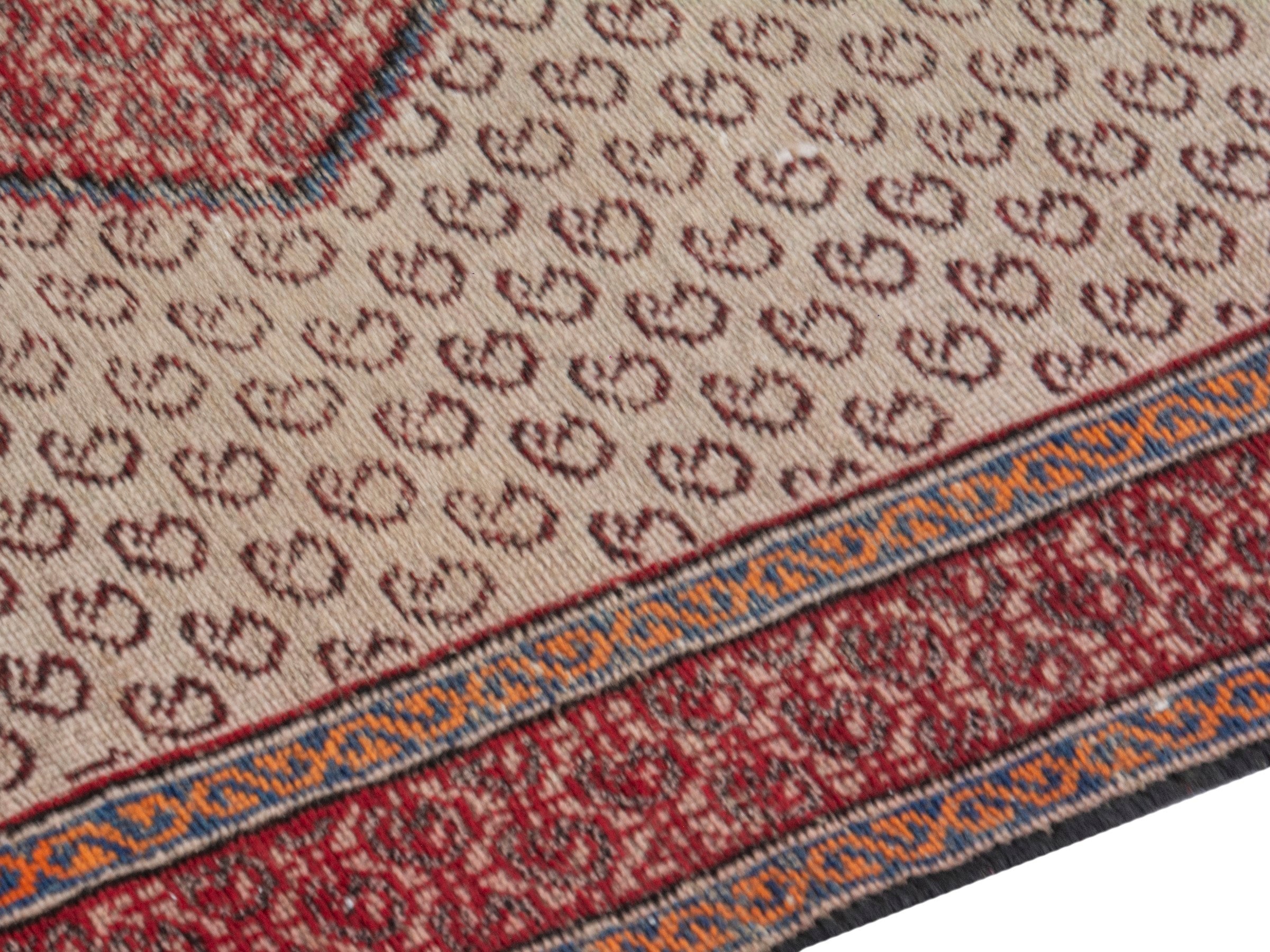 Persian Ferdos accent rug in cream and burgundy, view 6 of 19