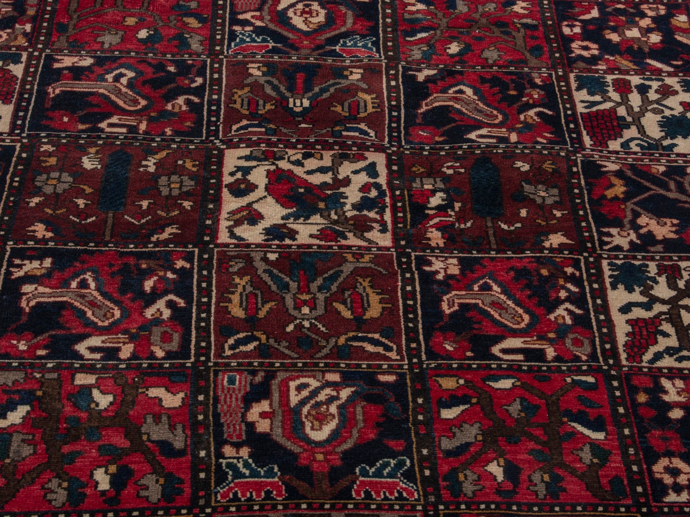 Persian Bakhtiari accent rug in deep red and navy, view 8 of 19
