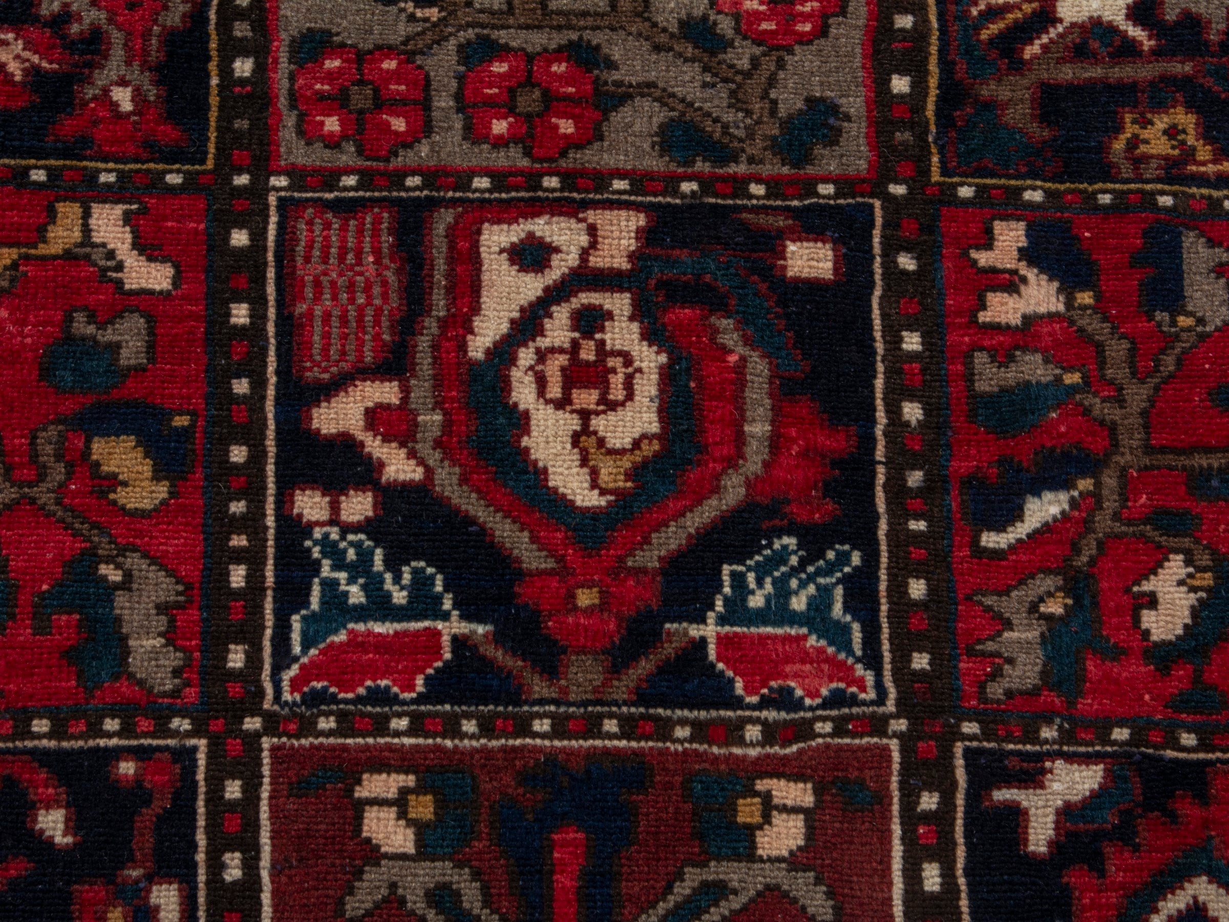 Persian Bakhtiari accent rug in deep red and navy, view 13 of 19
