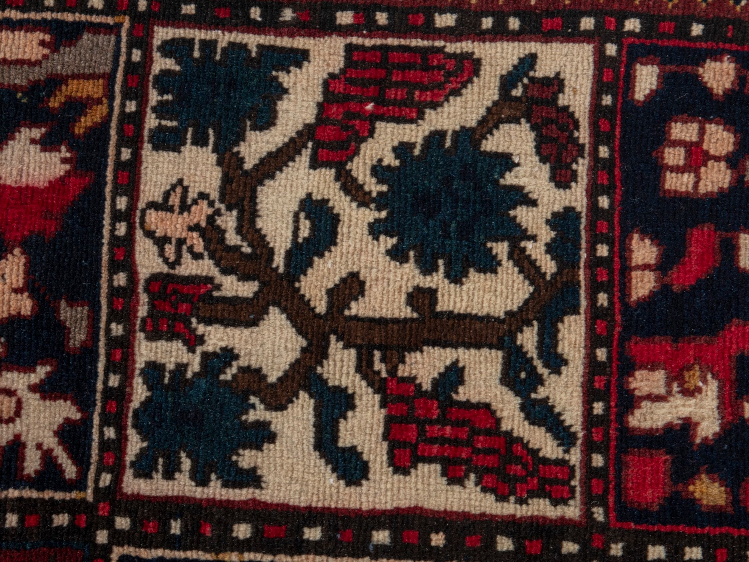 Persian Bakhtiari accent rug in deep red and navy, view 14 of 19