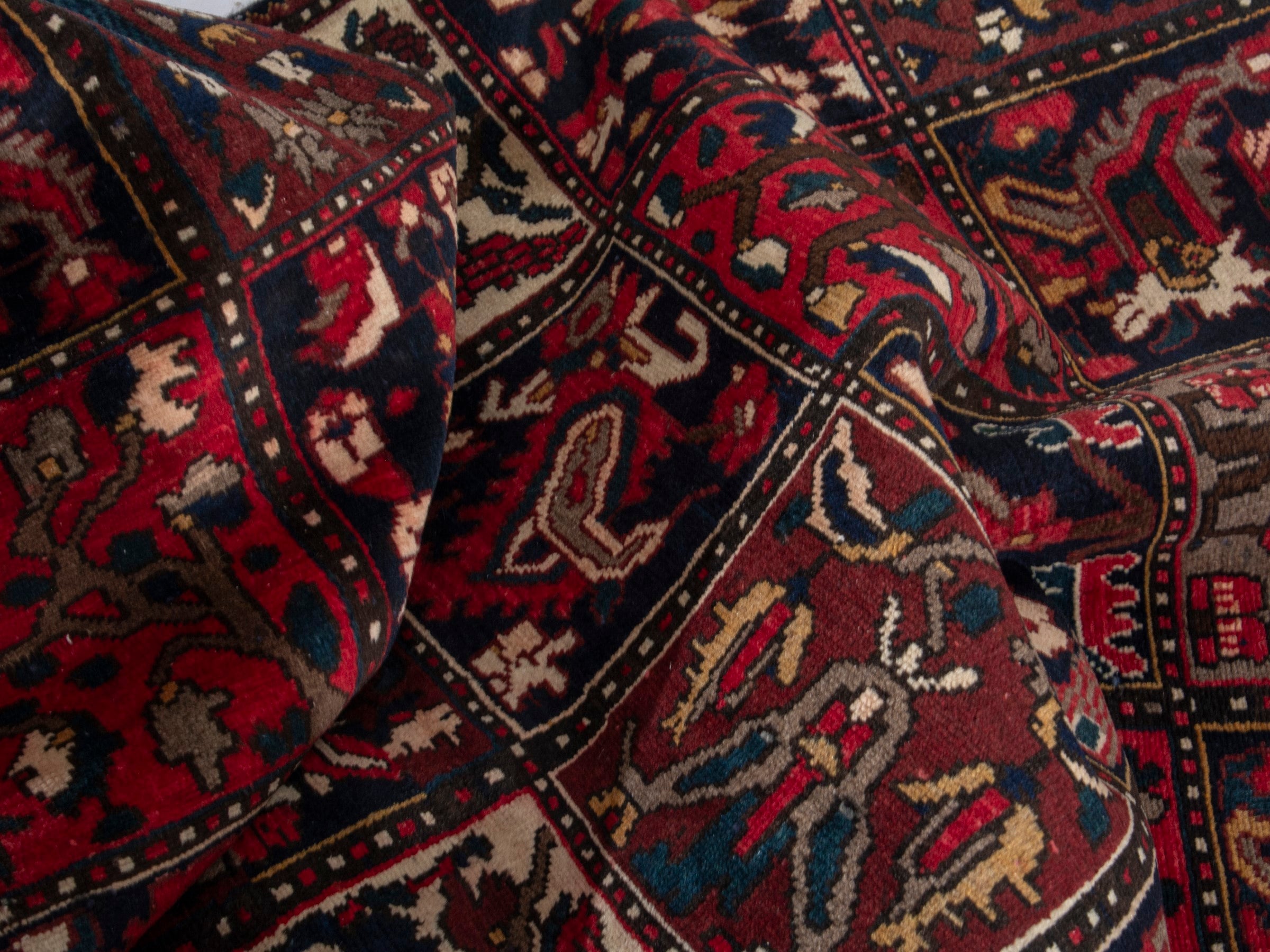 Persian Bakhtiari accent rug in deep red and navy, view 15 of 19