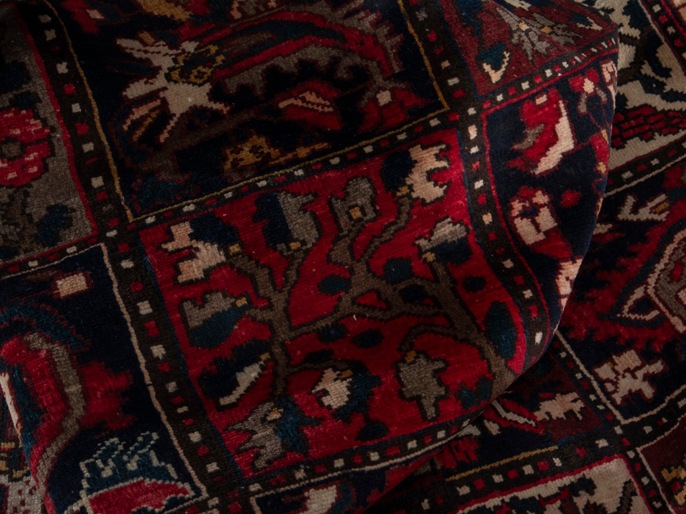 Persian Bakhtiari accent rug in deep red and navy, view 18 of 19
