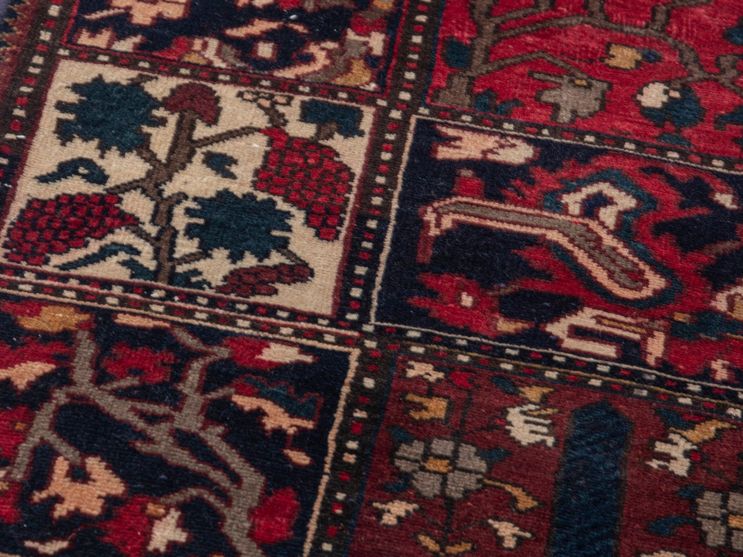 Persian Bakhtiari accent rug in deep red and navy, view 9 of 19