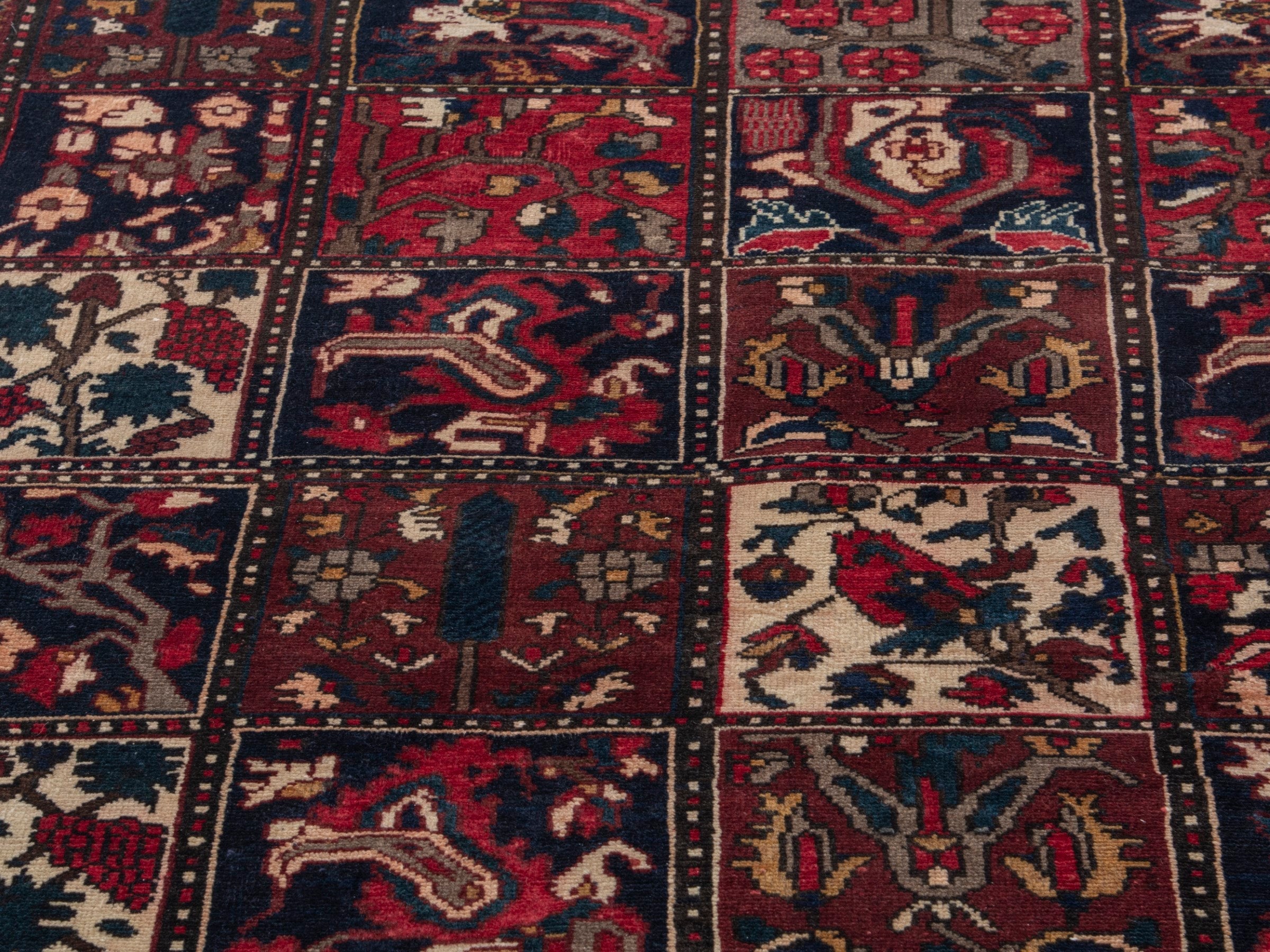 Persian Bakhtiari accent rug in deep red and navy, view 7 of 19