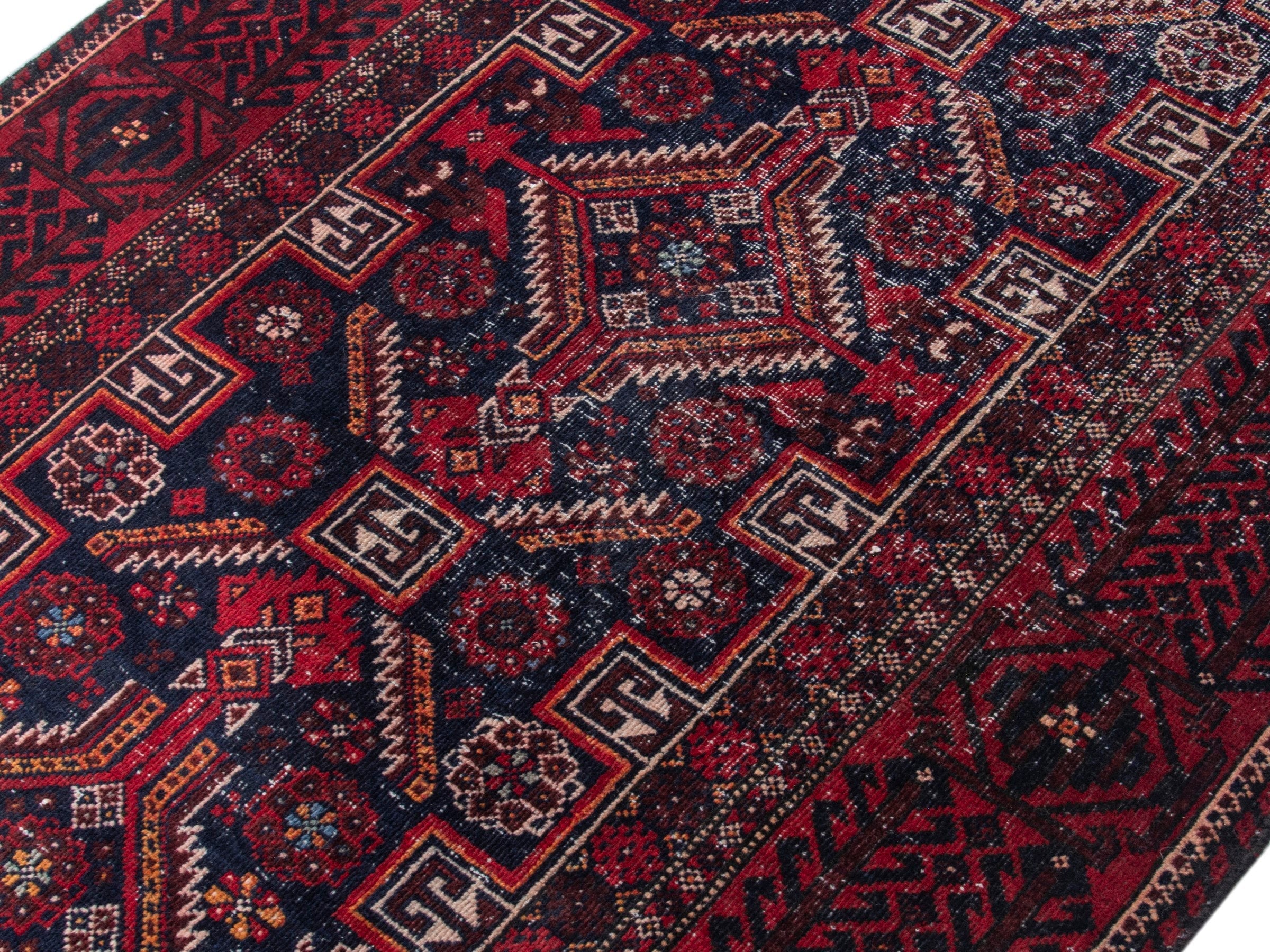 Persian Baluch runner rug in burgundy and deep red, view 4 of 18