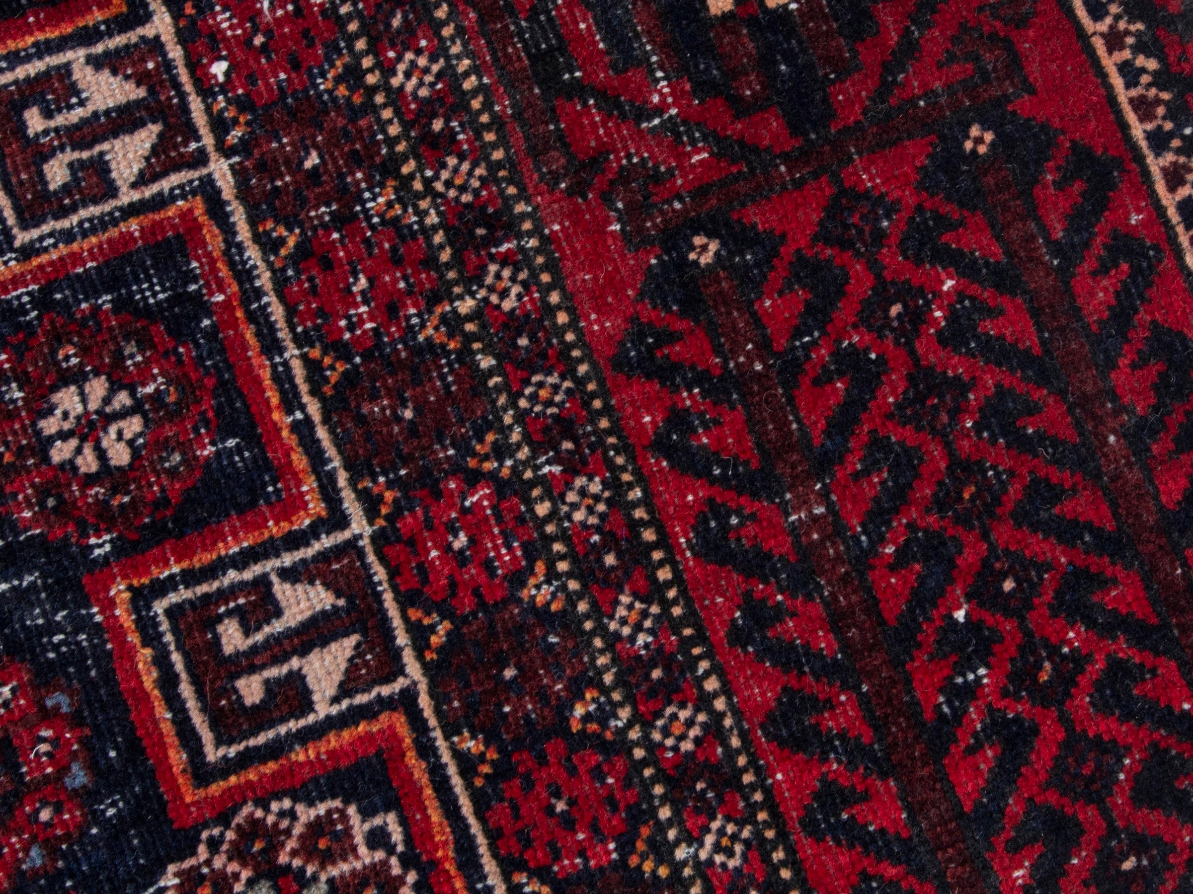 Persian Baluch runner rug in burgundy and deep red, view 9 of 18