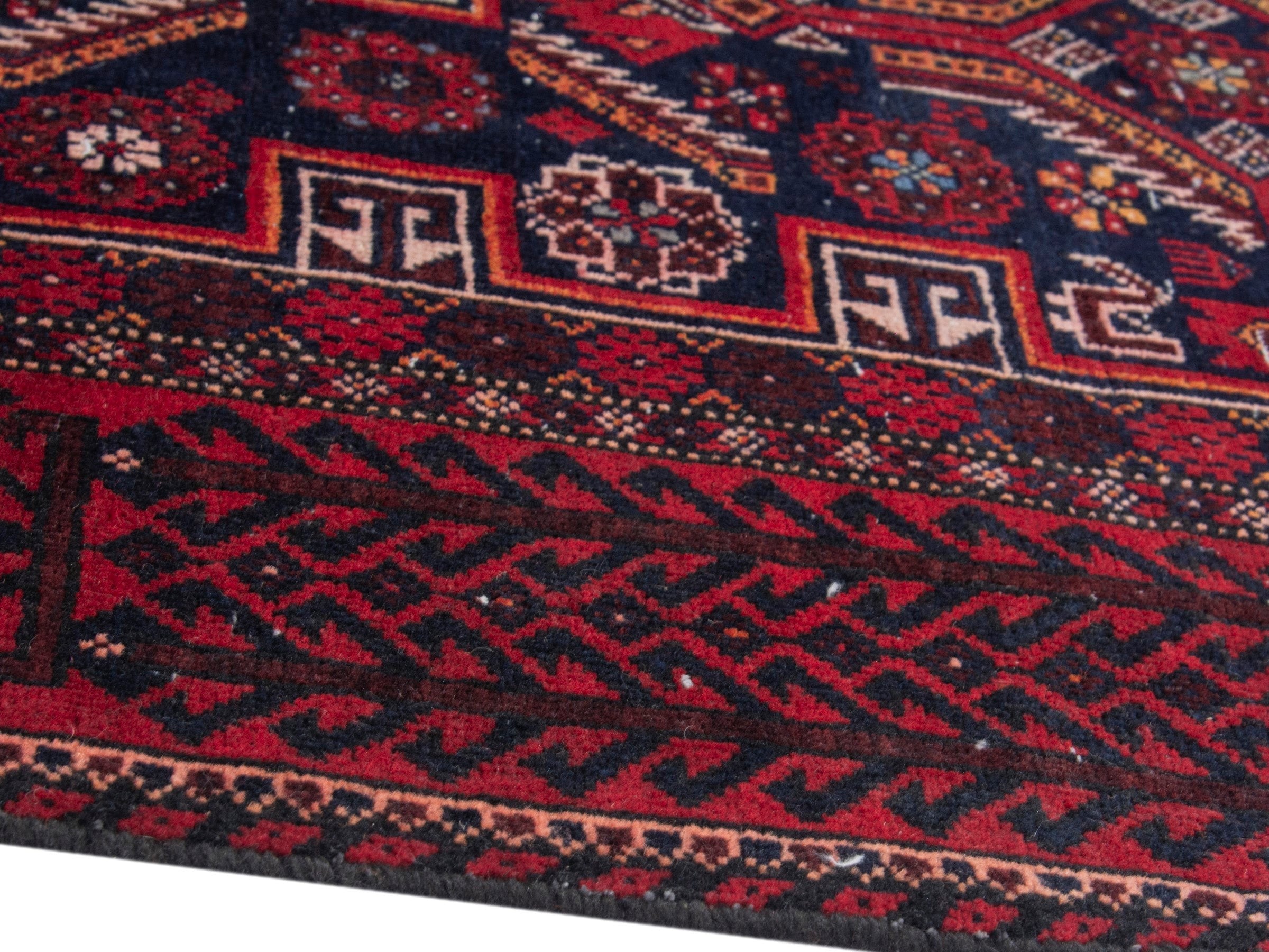 Persian Baluch runner rug in burgundy and deep red, view 6 of 18