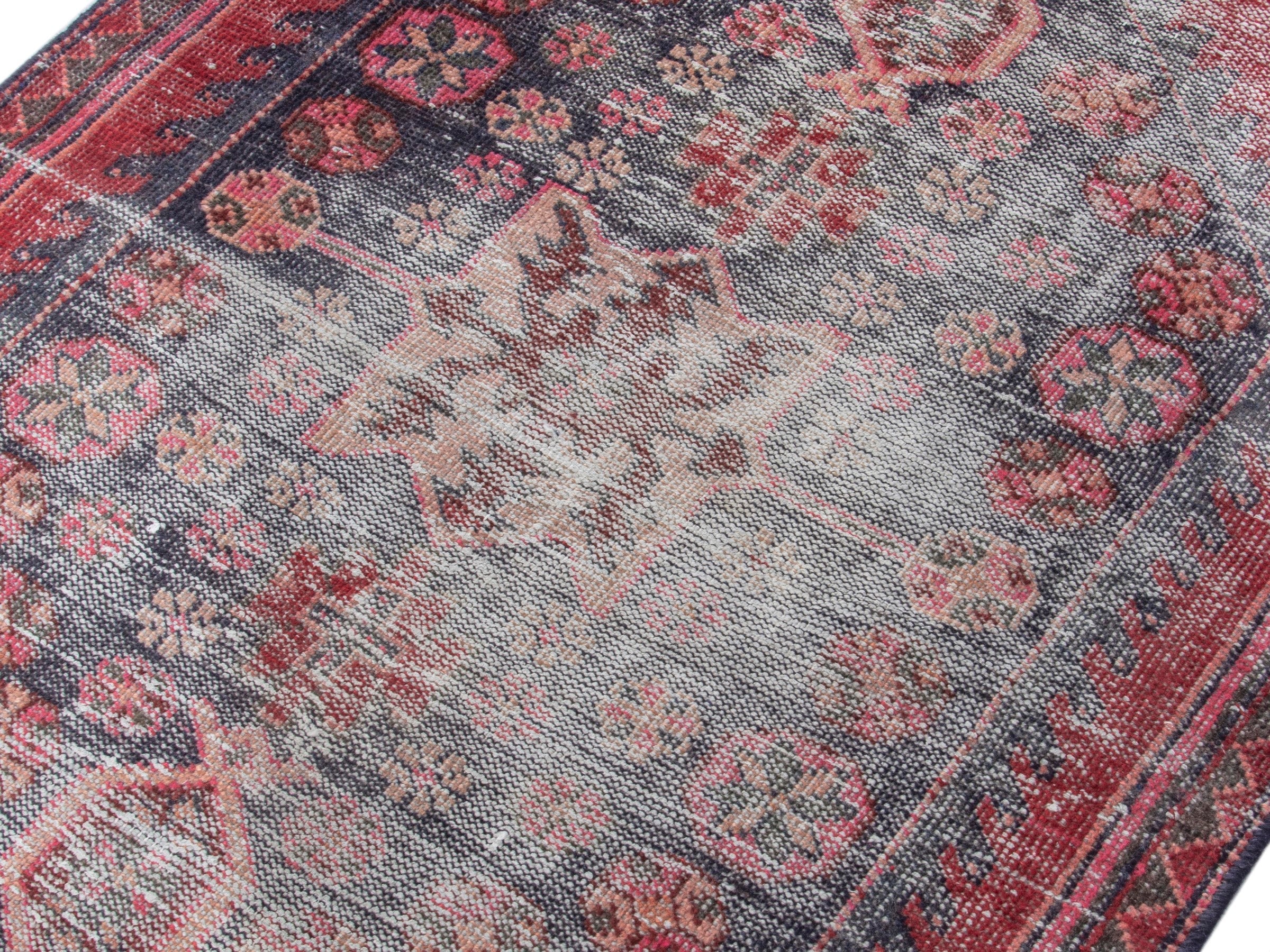 Persian Saveh runner rug in faded red and burgundy, view 4 of 19