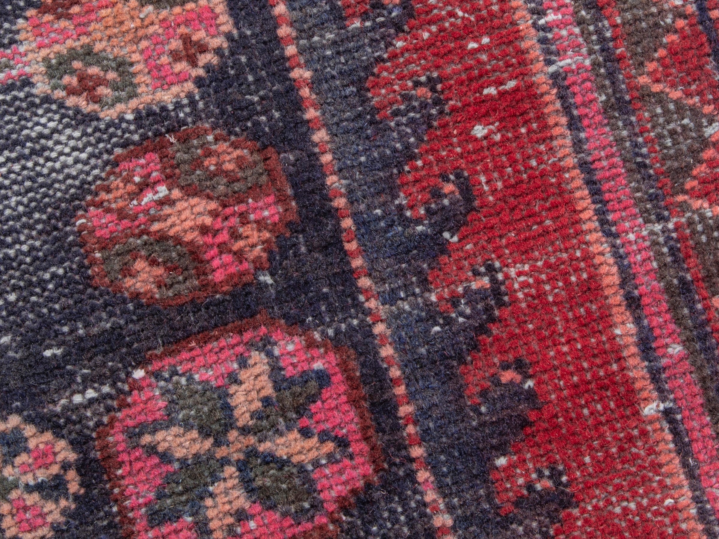 Persian Saveh runner rug in faded red and burgundy, view 9 of 19