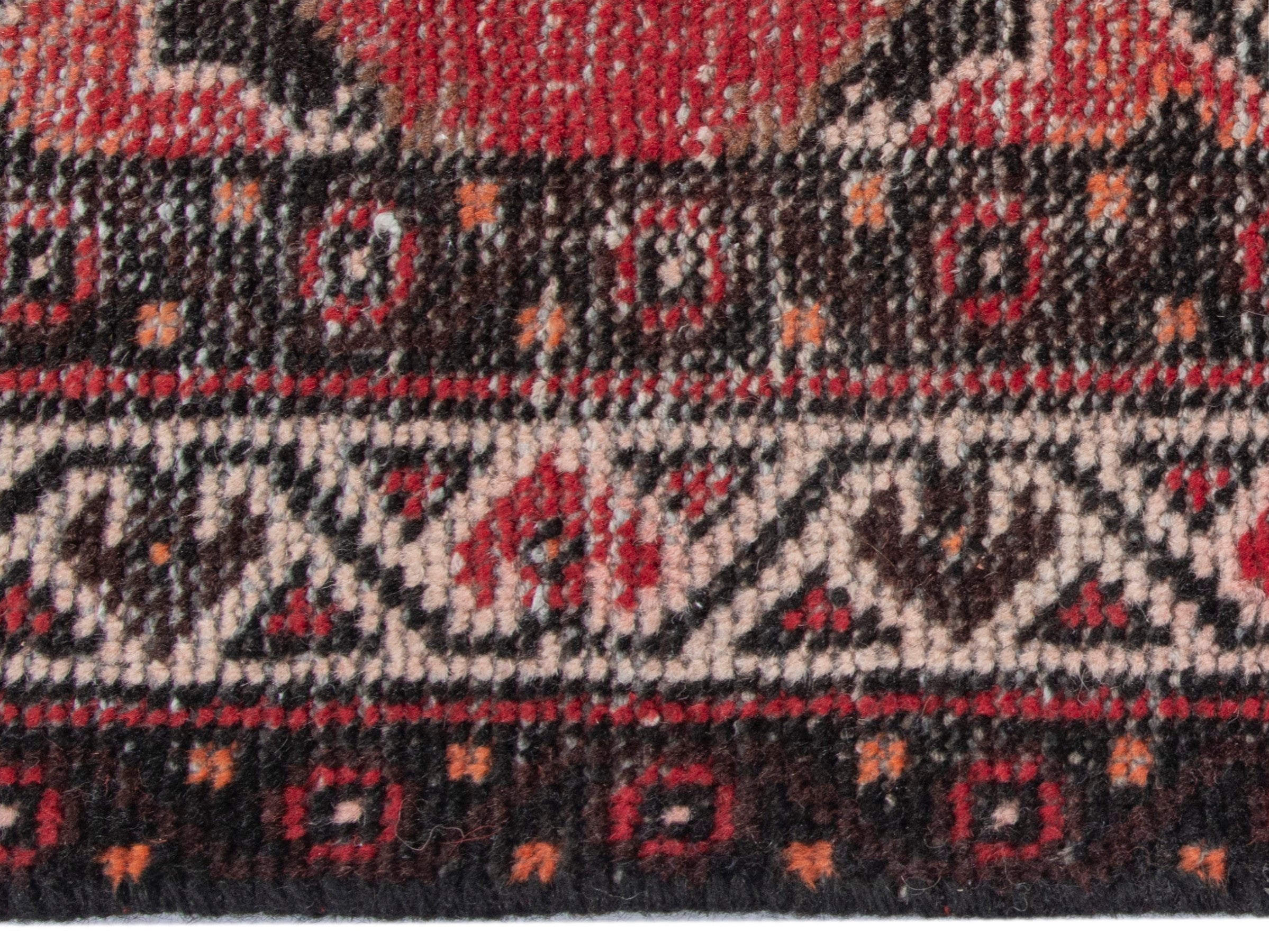 Persian Ferdos area rug in deep red and dark brown, view 10 of 17