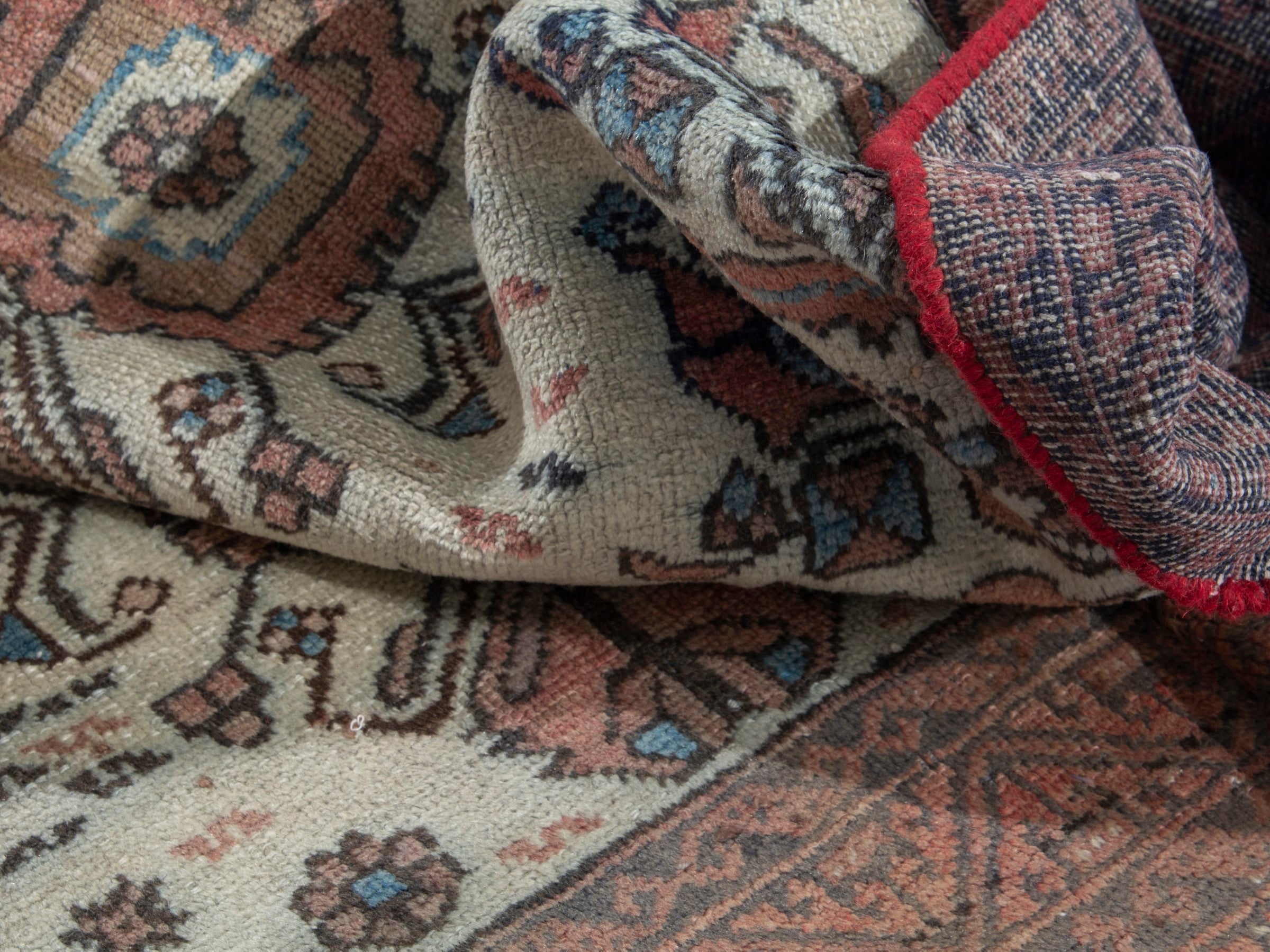 Persian Baluch accent rug in cream and rust, view 17 of 18