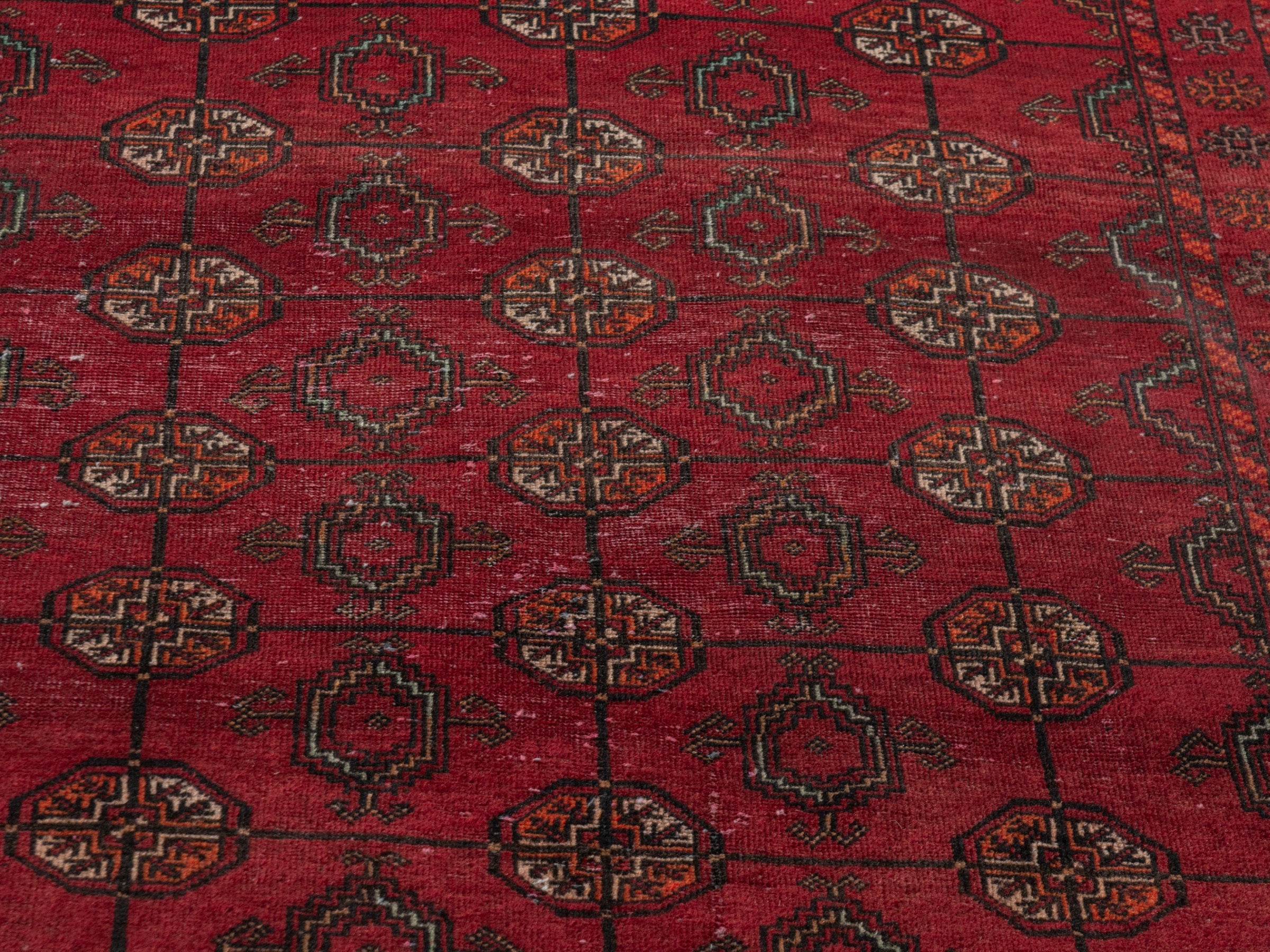 Persian Baluch runner rug in deep red and burgundy, view 8 of 18