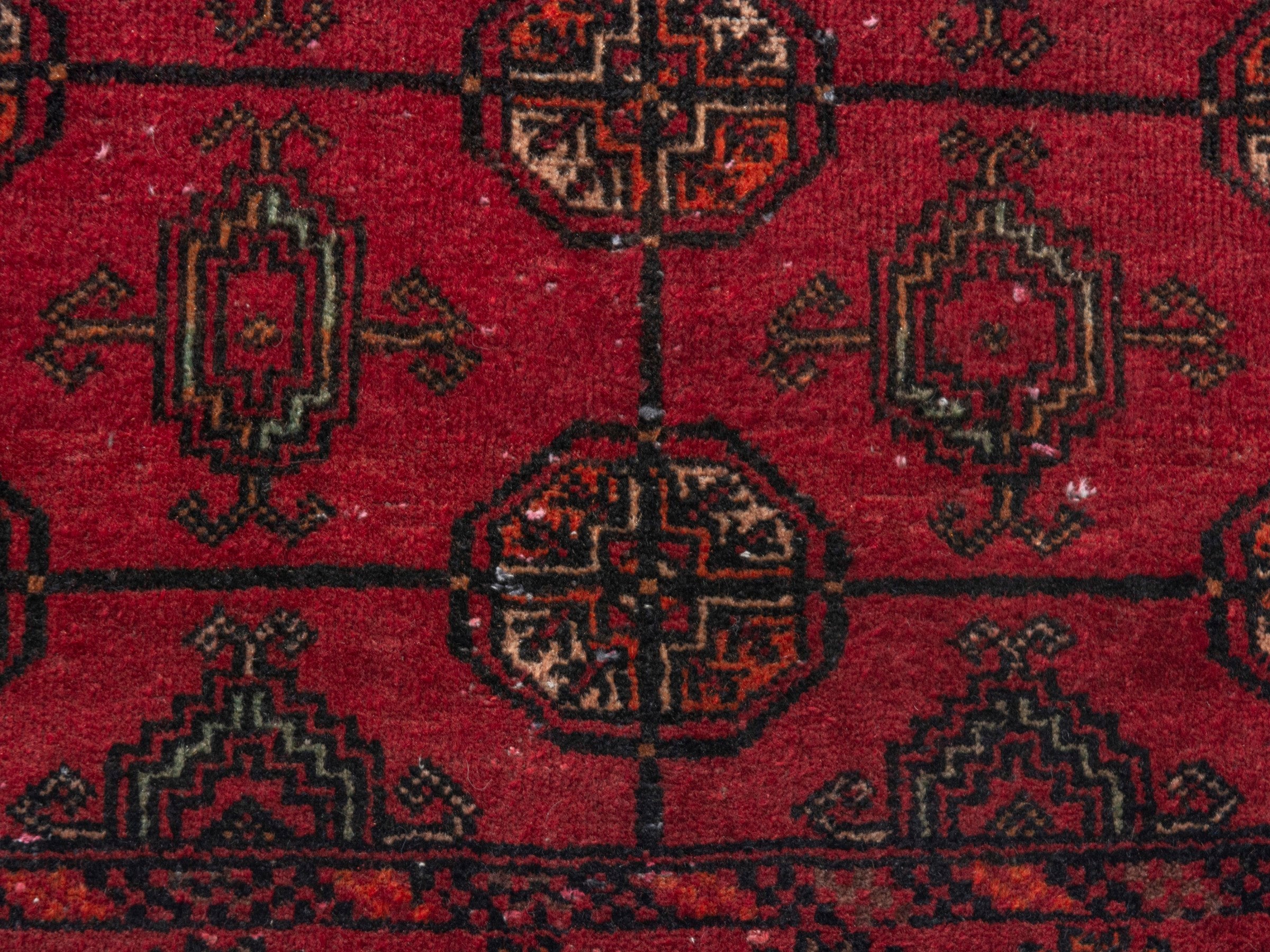 Persian Baluch runner rug in deep red and burgundy, view 11 of 18