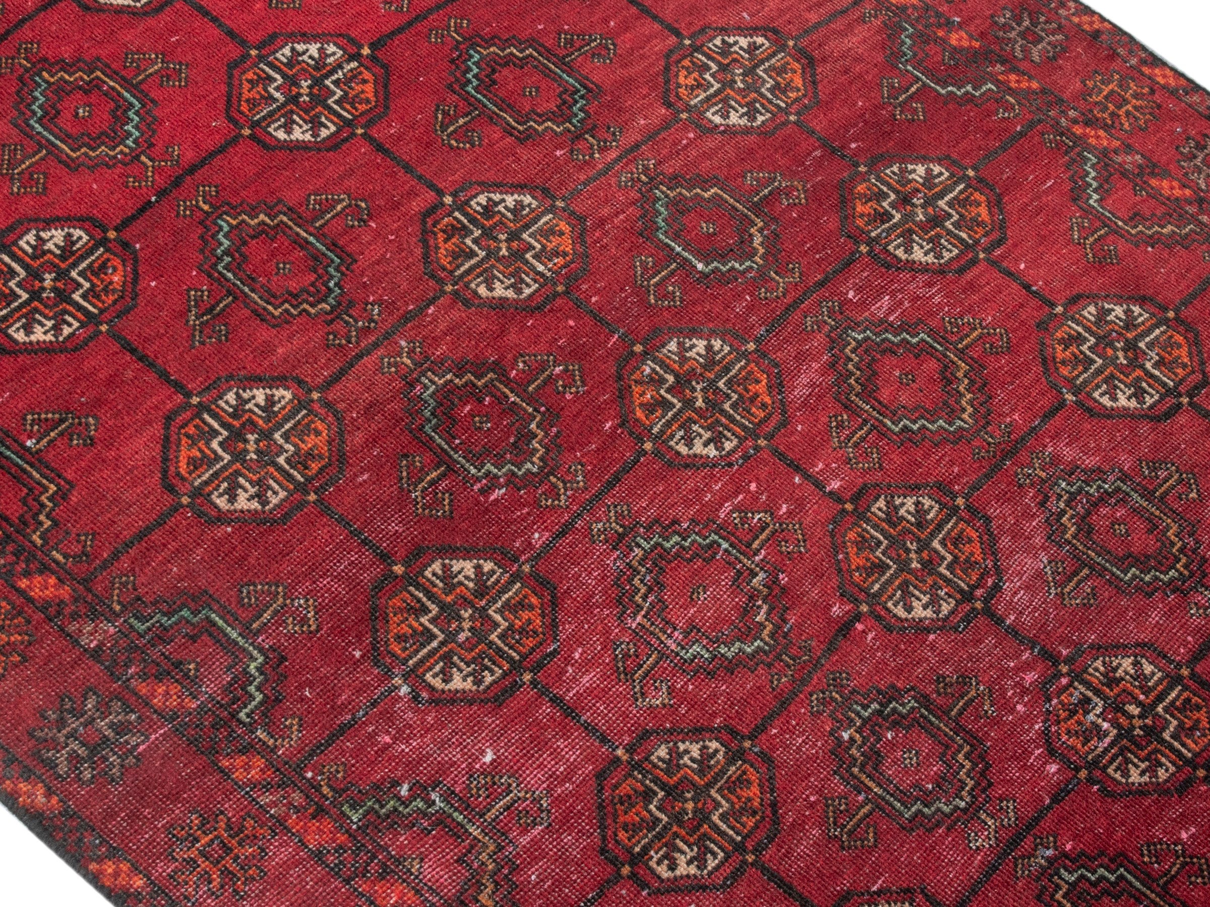 Persian Baluch runner rug in deep red and burgundy, view 4 of 18