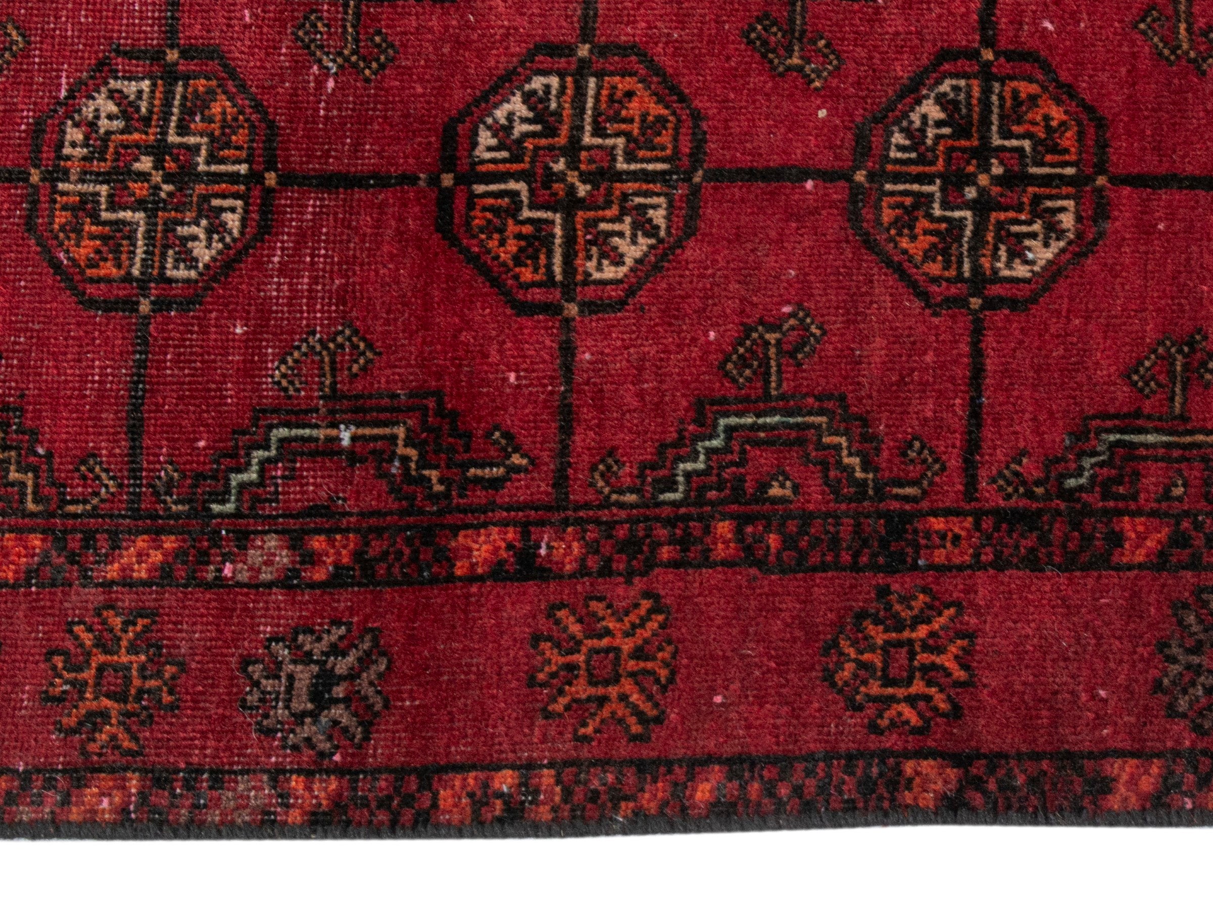 Persian Baluch runner rug in deep red and burgundy, view 10 of 18