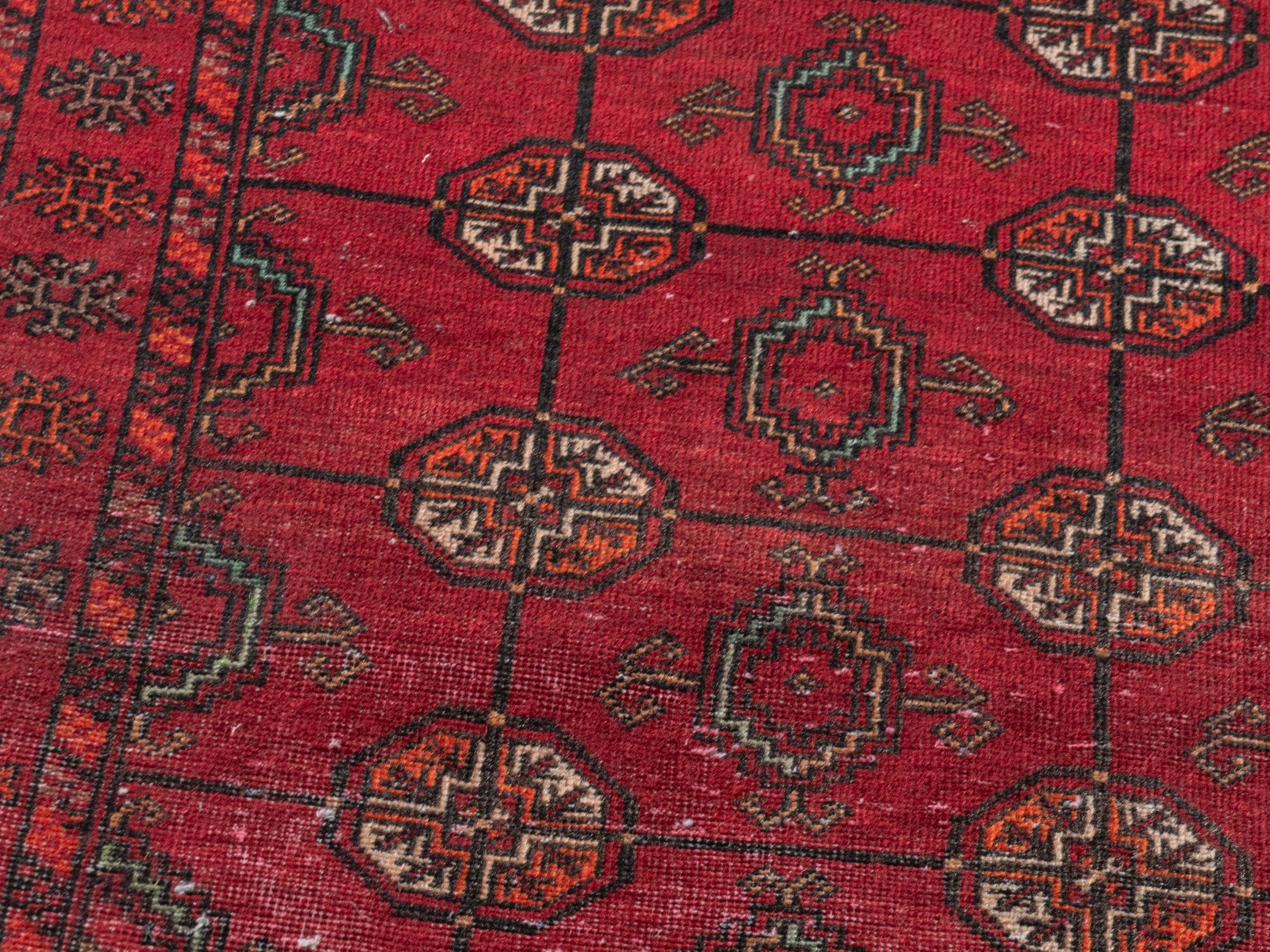 Persian Baluch runner rug in deep red and burgundy, view 9 of 18