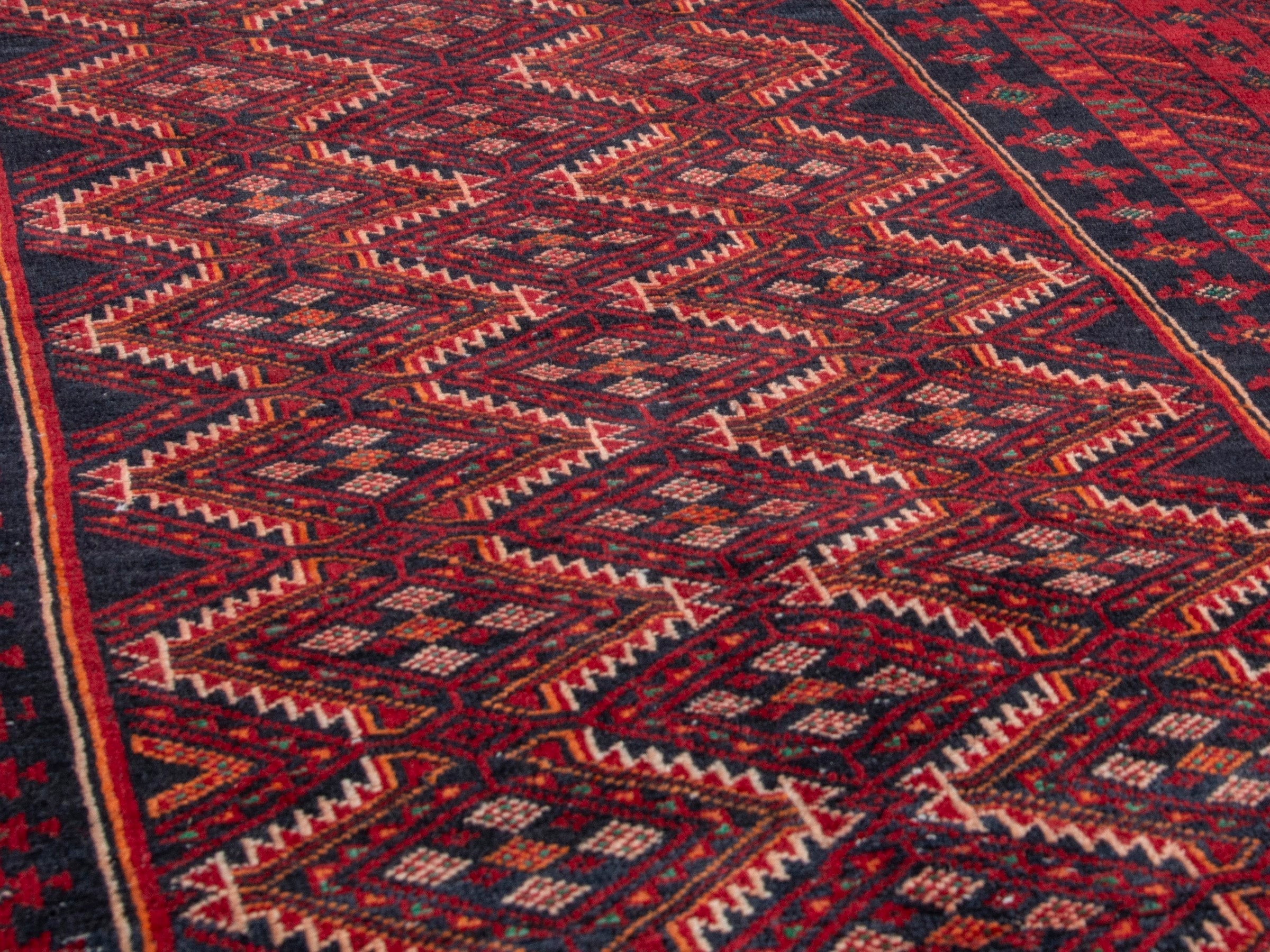 Persian Baluch runner rug in burgundy and deep red, view 8 of 18