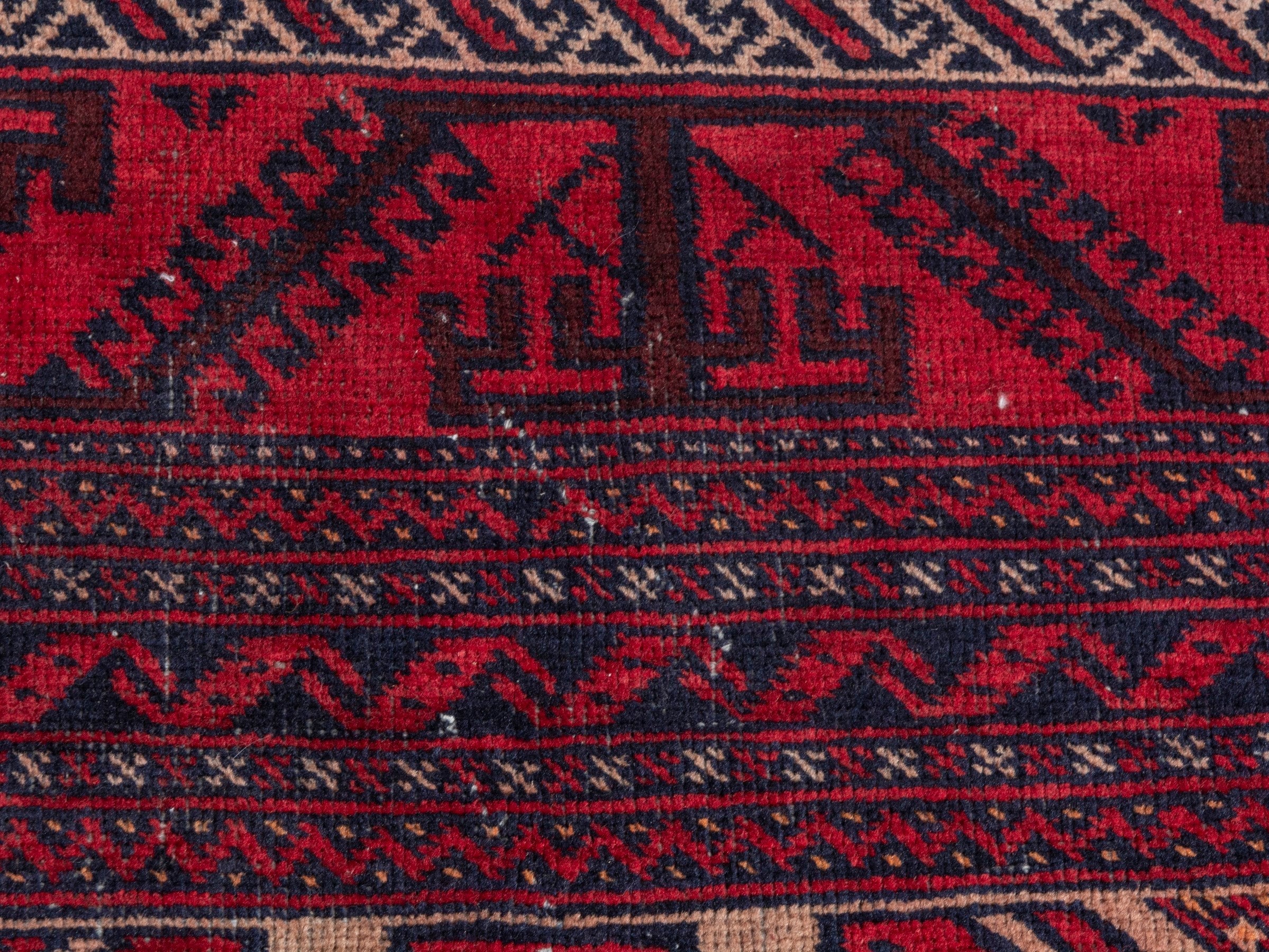 Persian Baluch area rug in deep red and burgundy, view 15 of 22