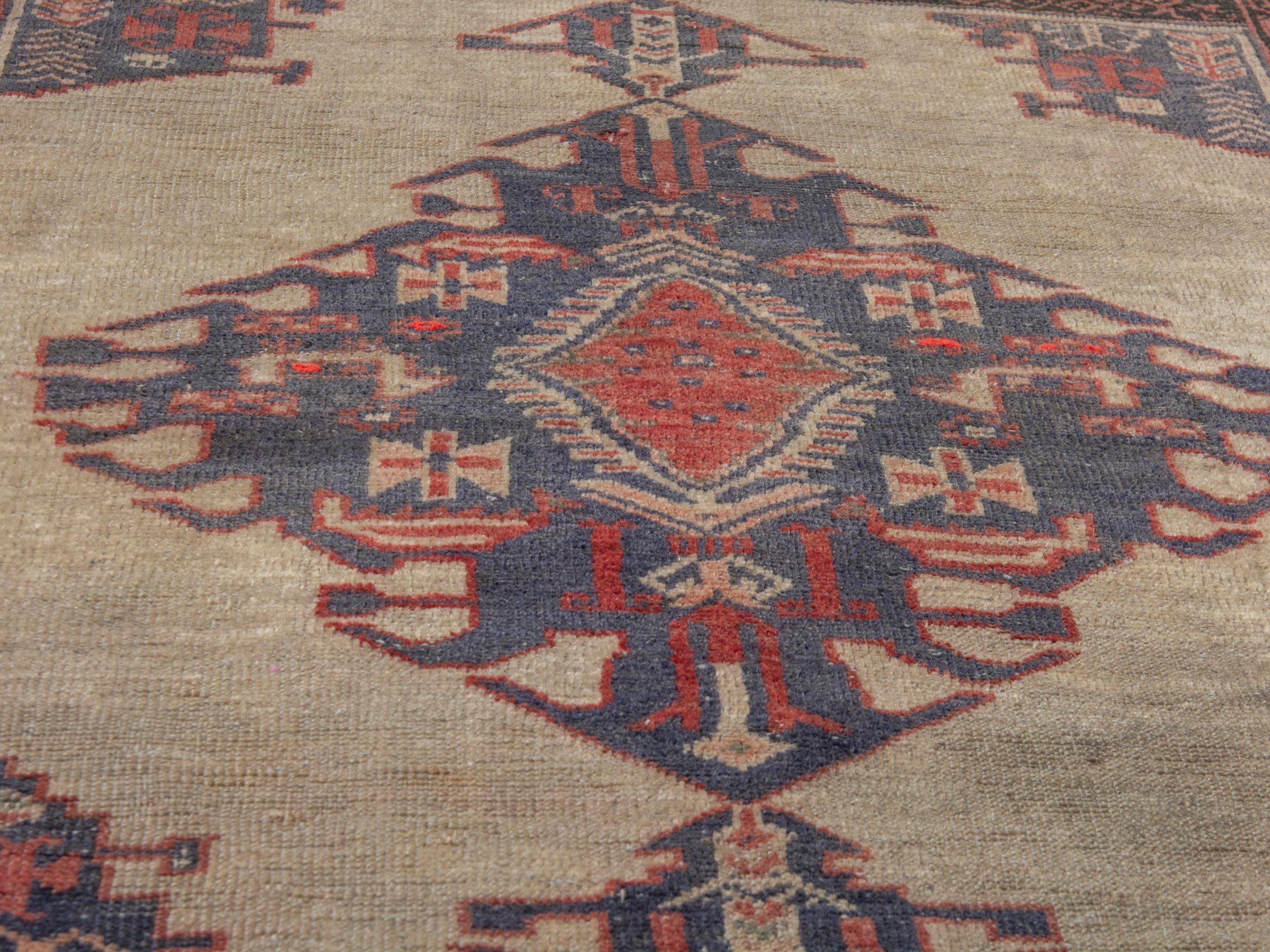Persian Torkaman accent rug in cream and navy, view 13 of 17