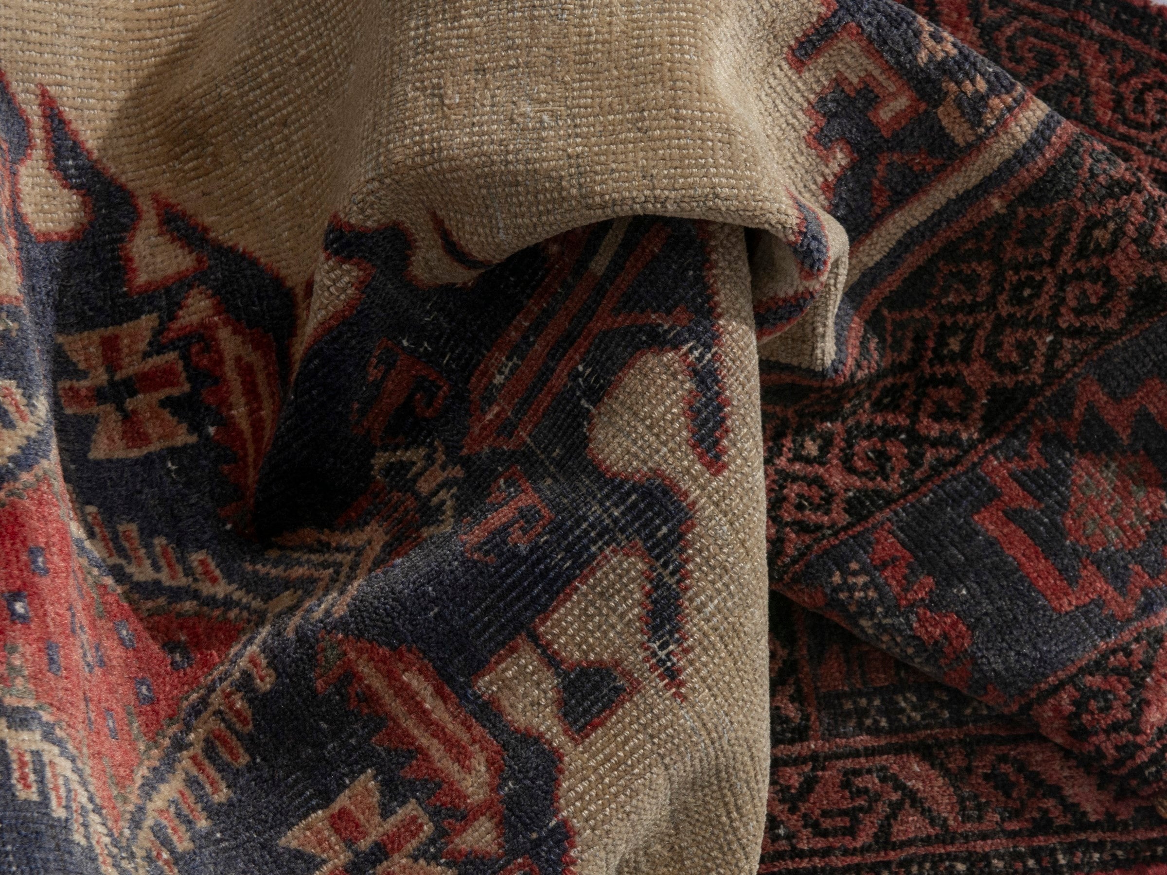 Persian Torkaman accent rug in cream and navy, view 16 of 17