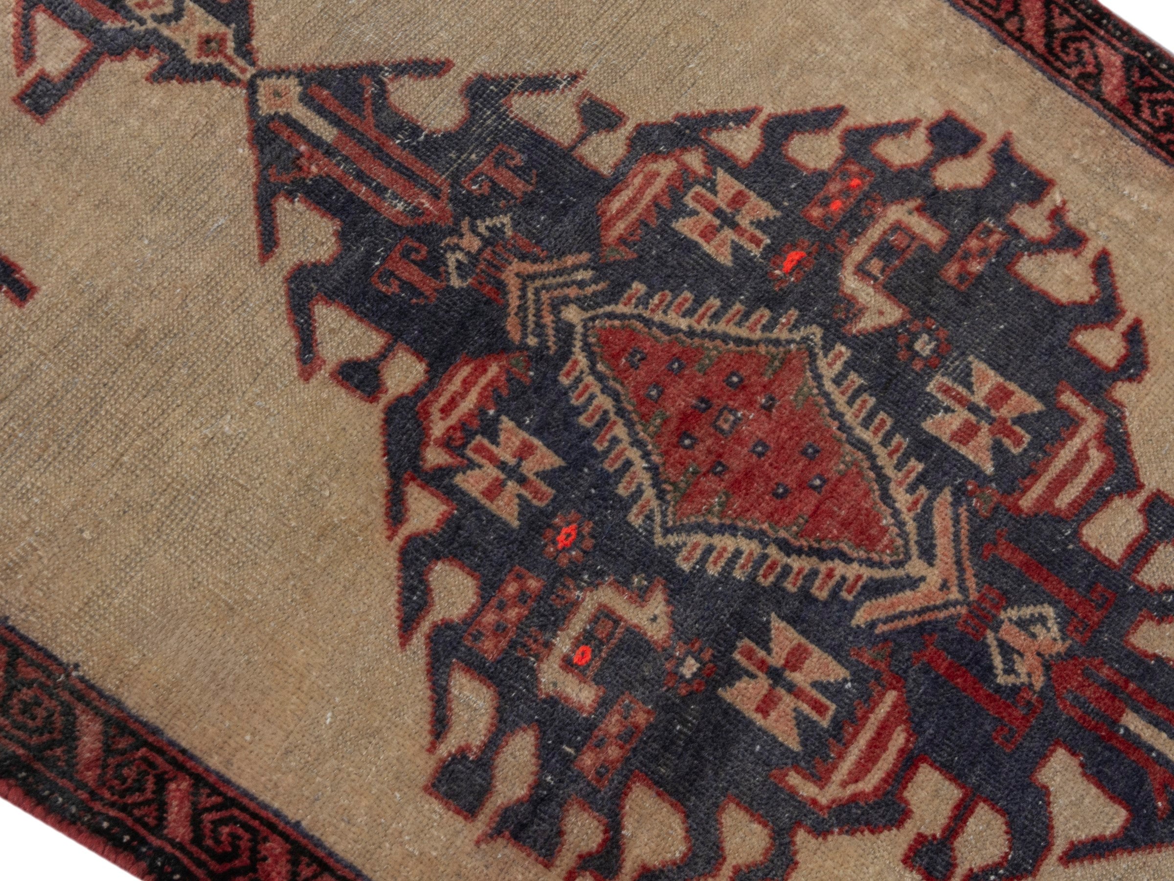 Persian Torkaman accent rug in cream and navy, view 4 of 17
