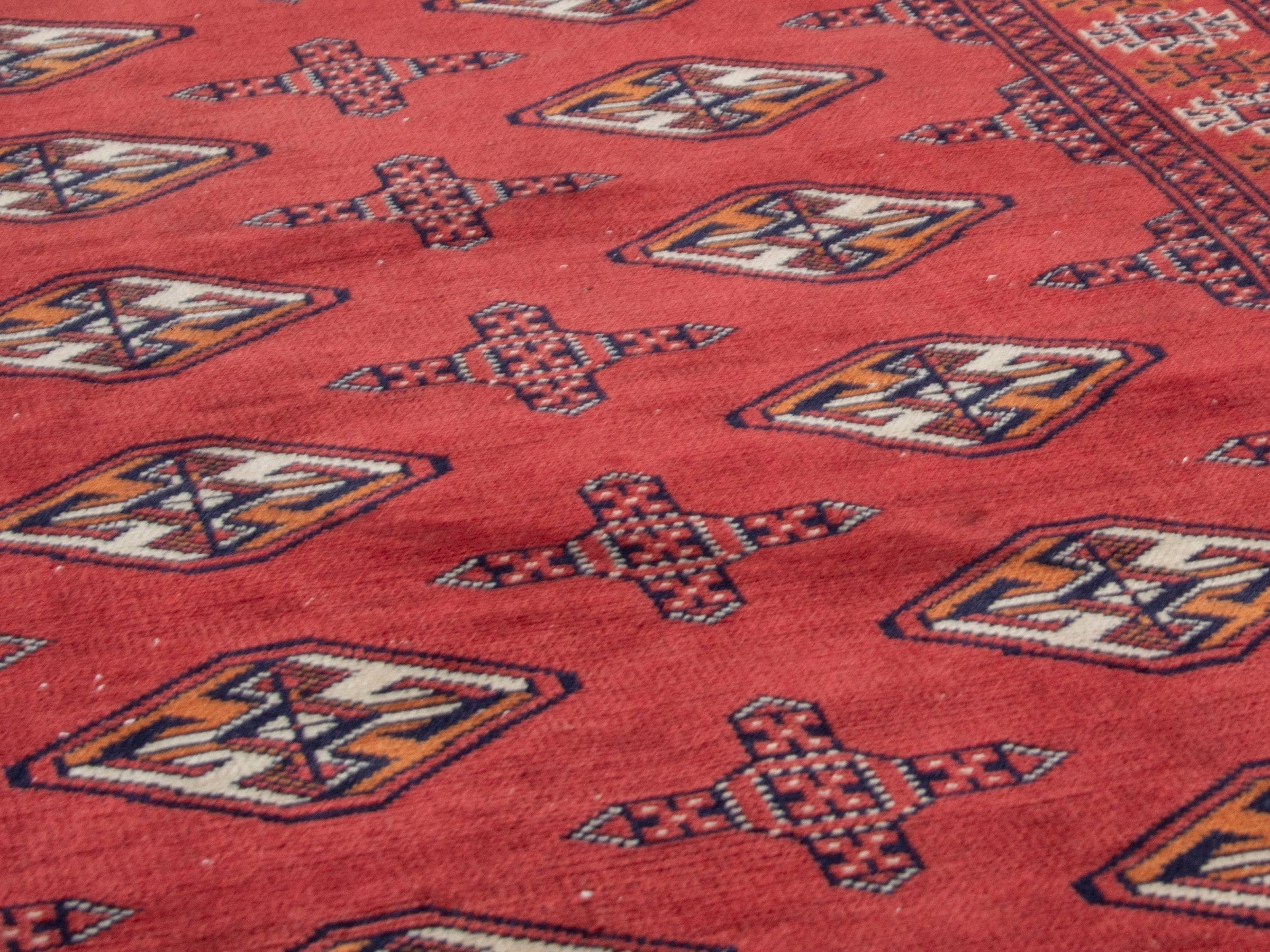 Persian Torkaman runner rug in deep red and cream, view 8 of 17
