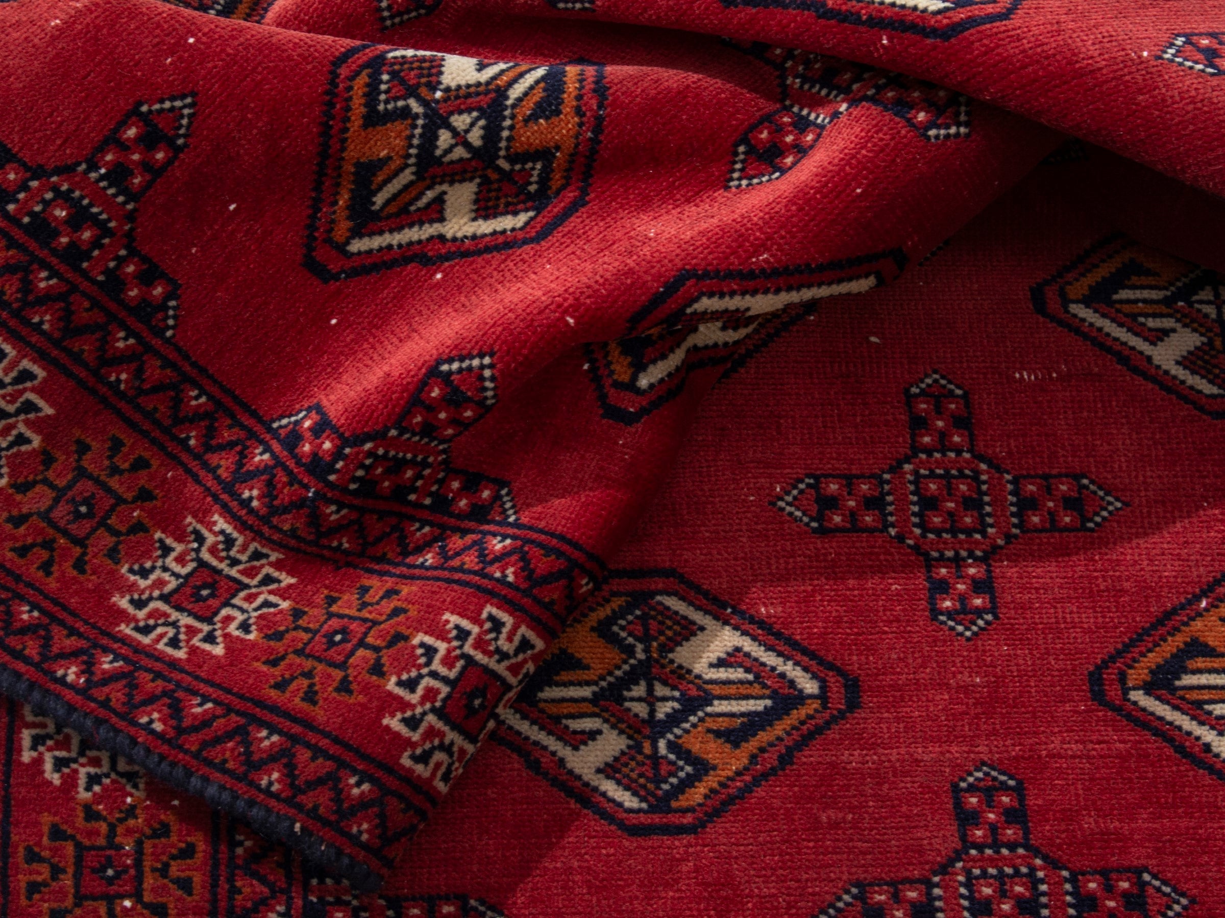 Persian Torkaman runner rug in deep red and cream, view 15 of 17