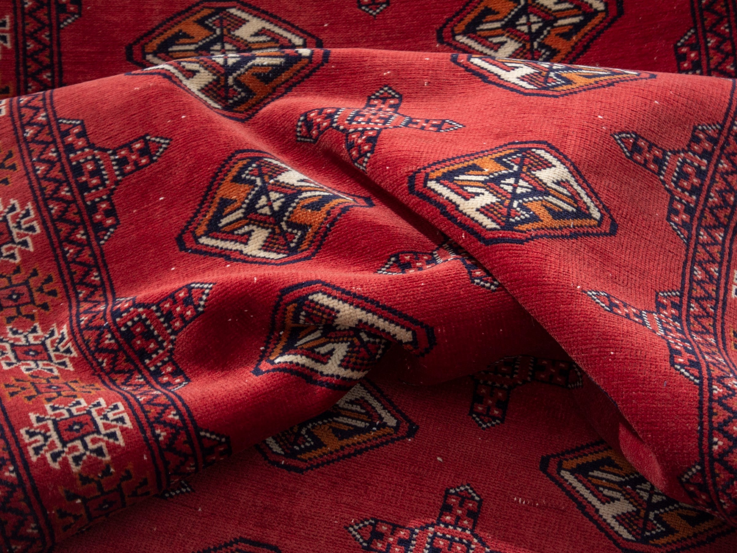 Persian Torkaman runner rug in deep red and cream, view 16 of 17