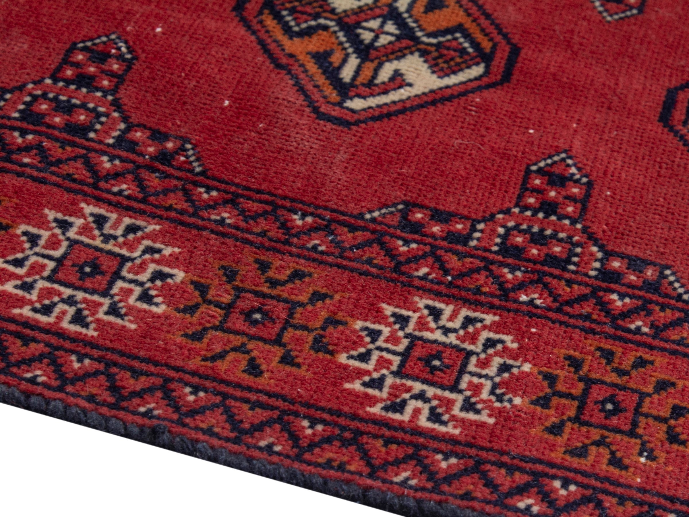 Persian Torkaman runner rug in deep red and cream, view 6 of 17