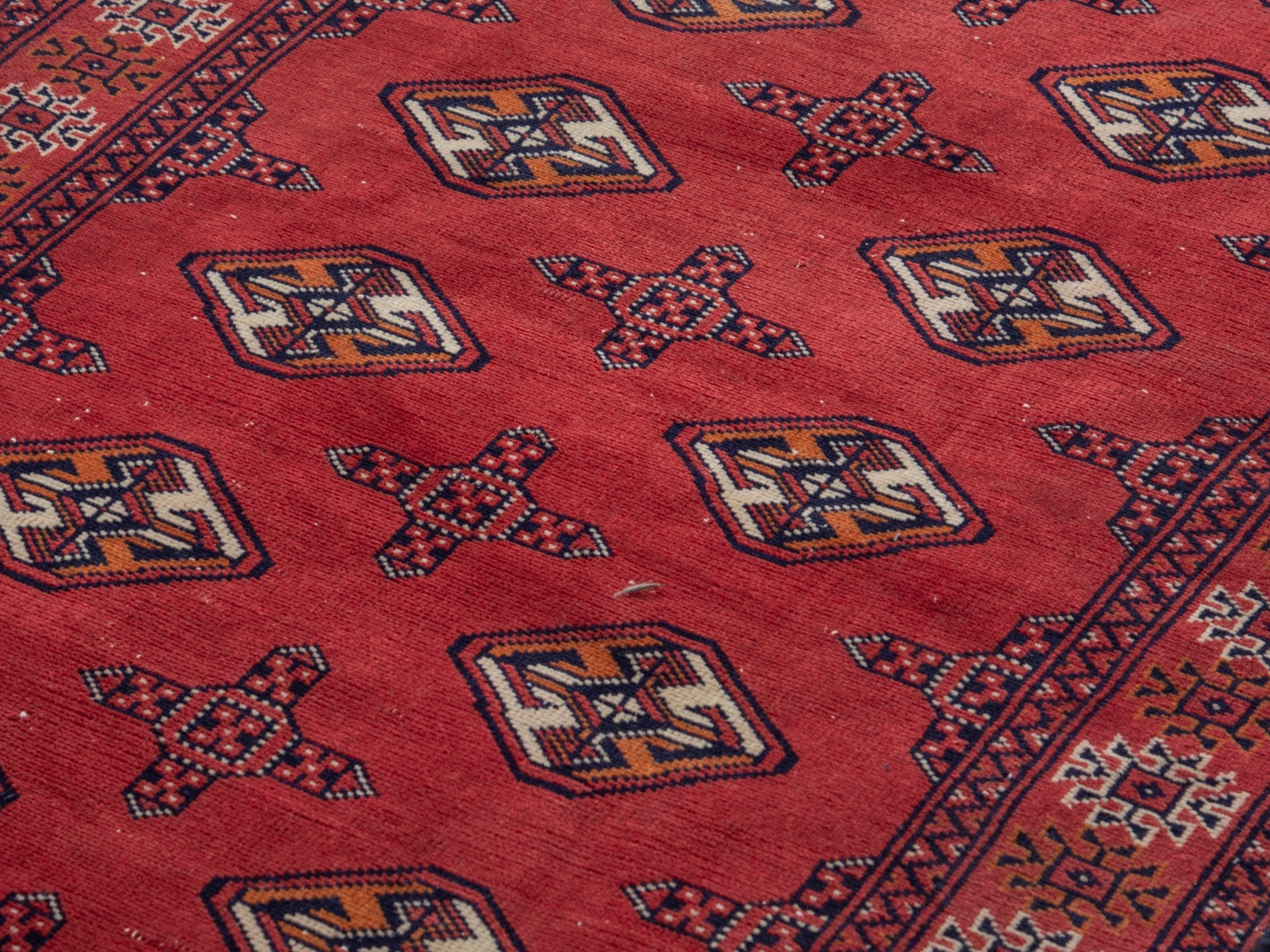 Persian Torkaman runner rug in deep red and cream, view 7 of 17