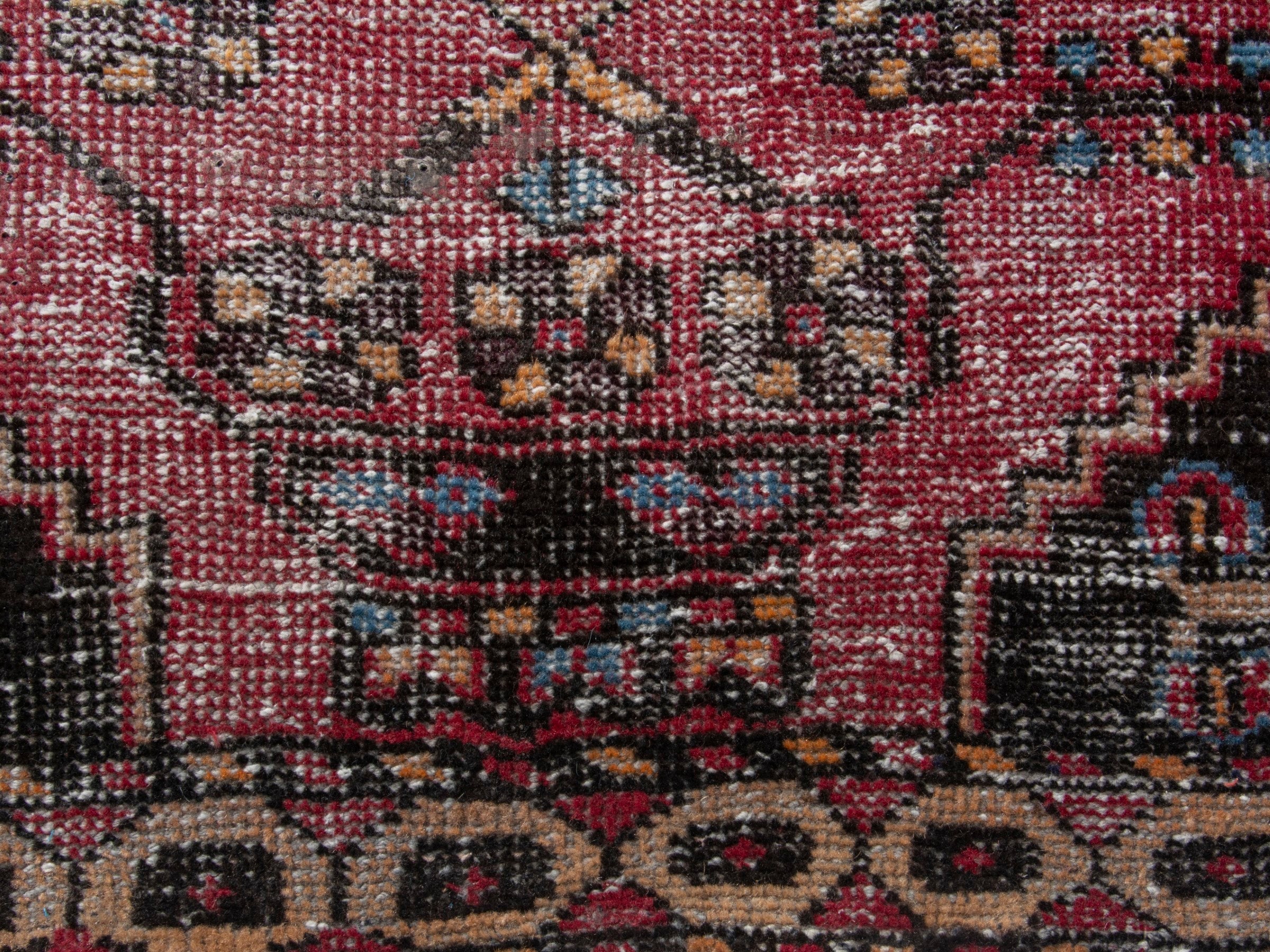 Persian Ferdos accent rug in dusty rose and black cherry, view 11 of 18
