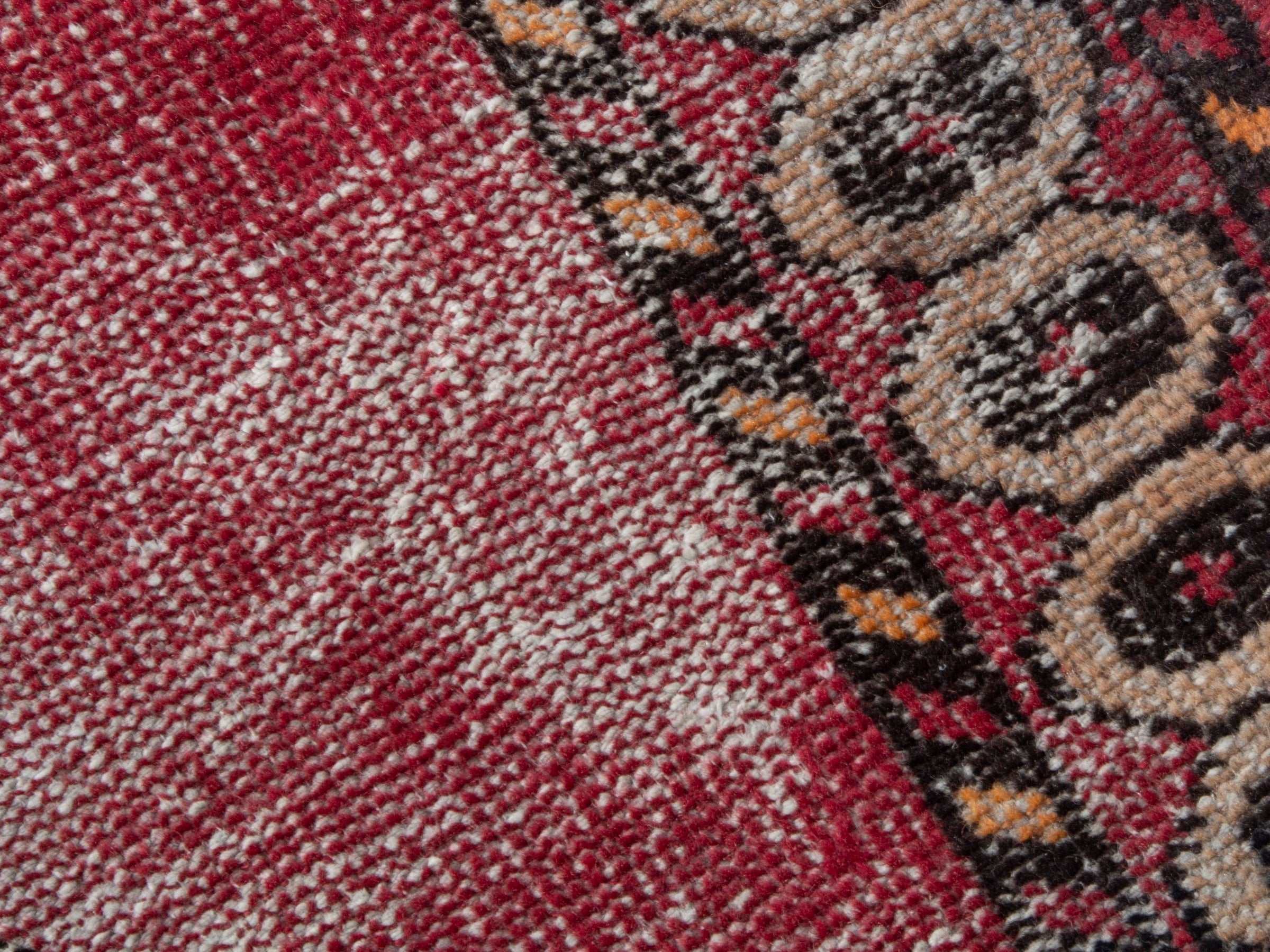 Persian Ferdos accent rug in dusty rose and black cherry, view 9 of 18