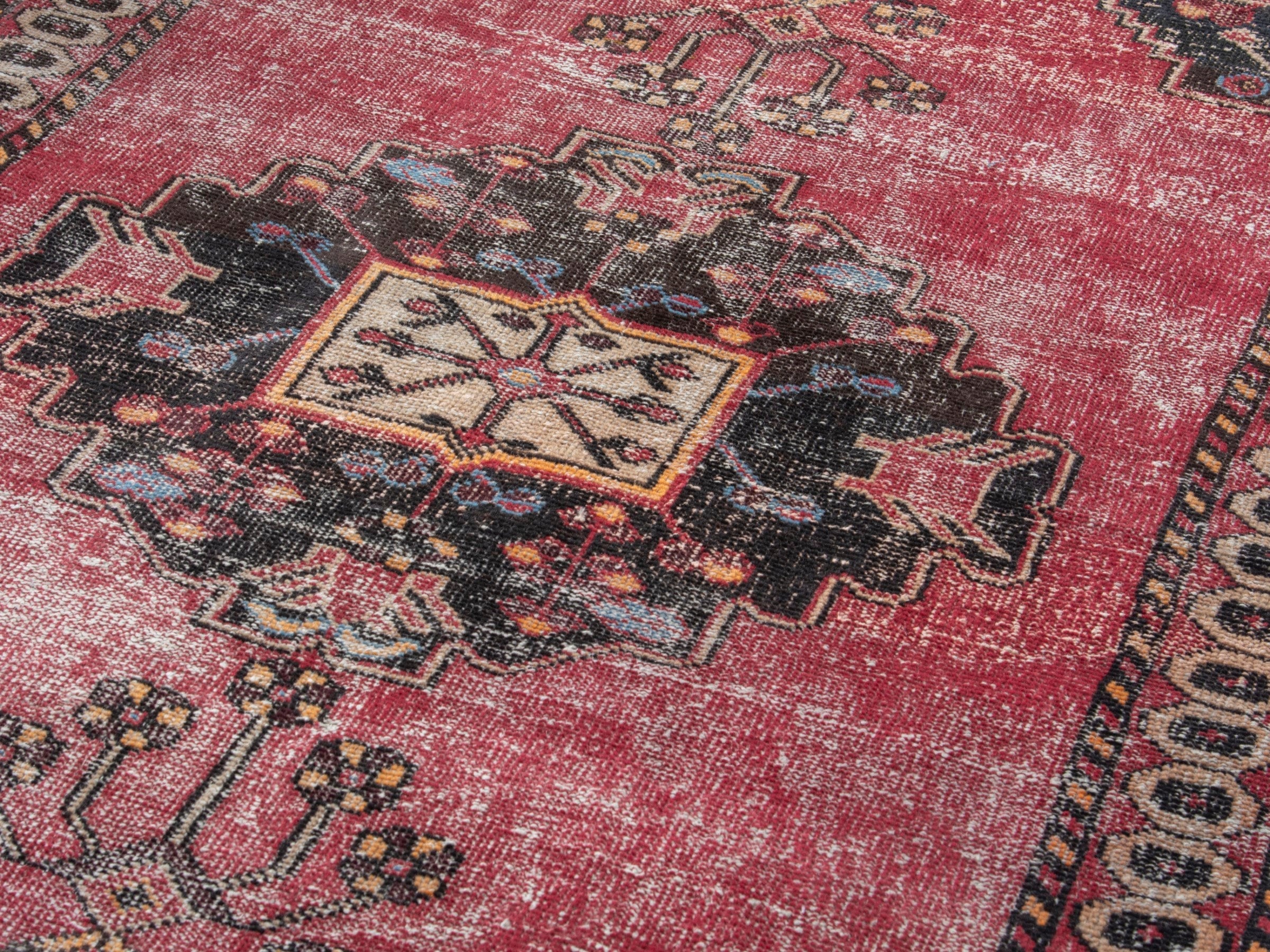 Persian Ferdos accent rug in dusty rose and black cherry, view 7 of 18