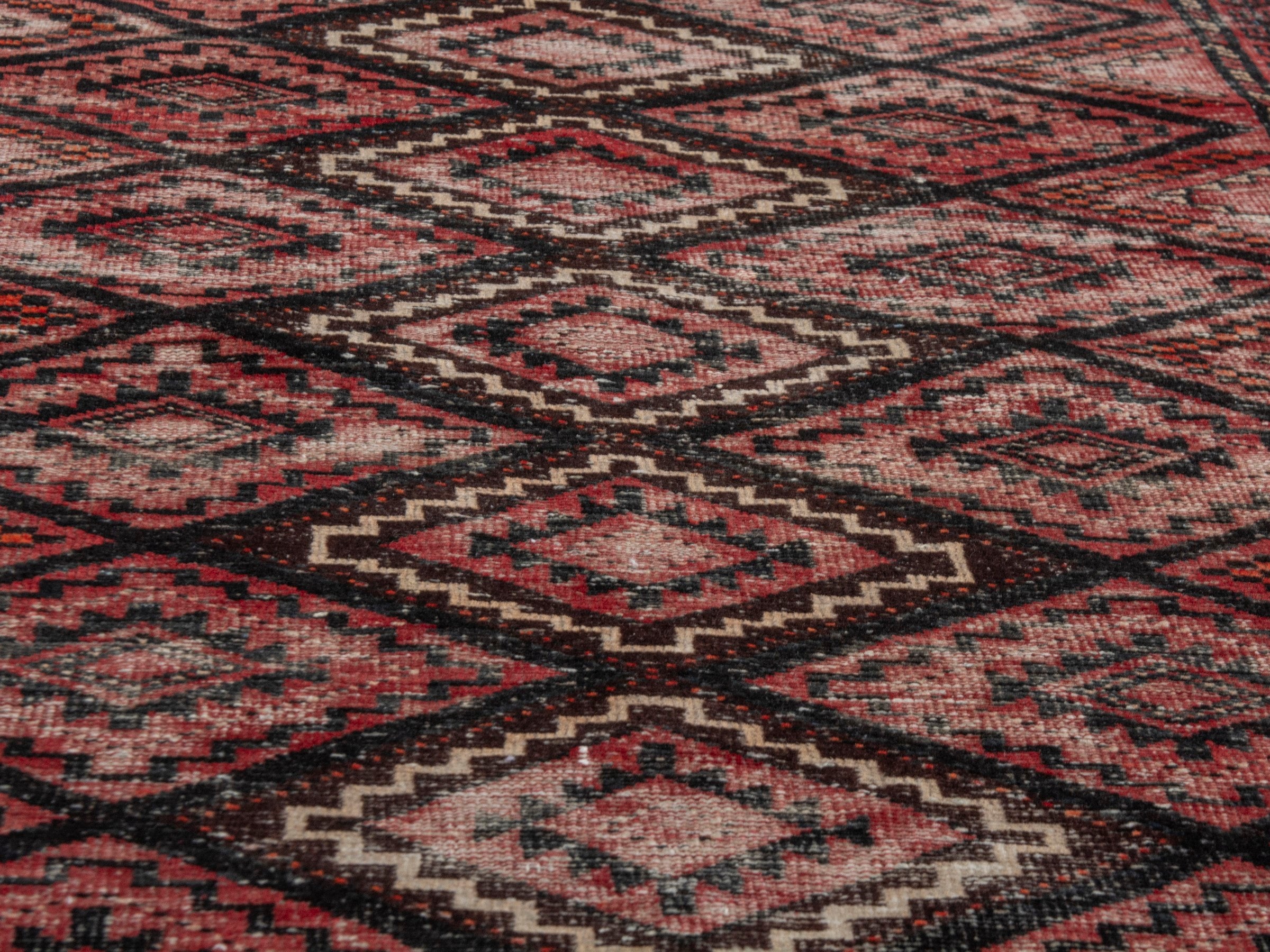 Persian Baluch runner rug in deep red and burgundy, view 8 of 18
