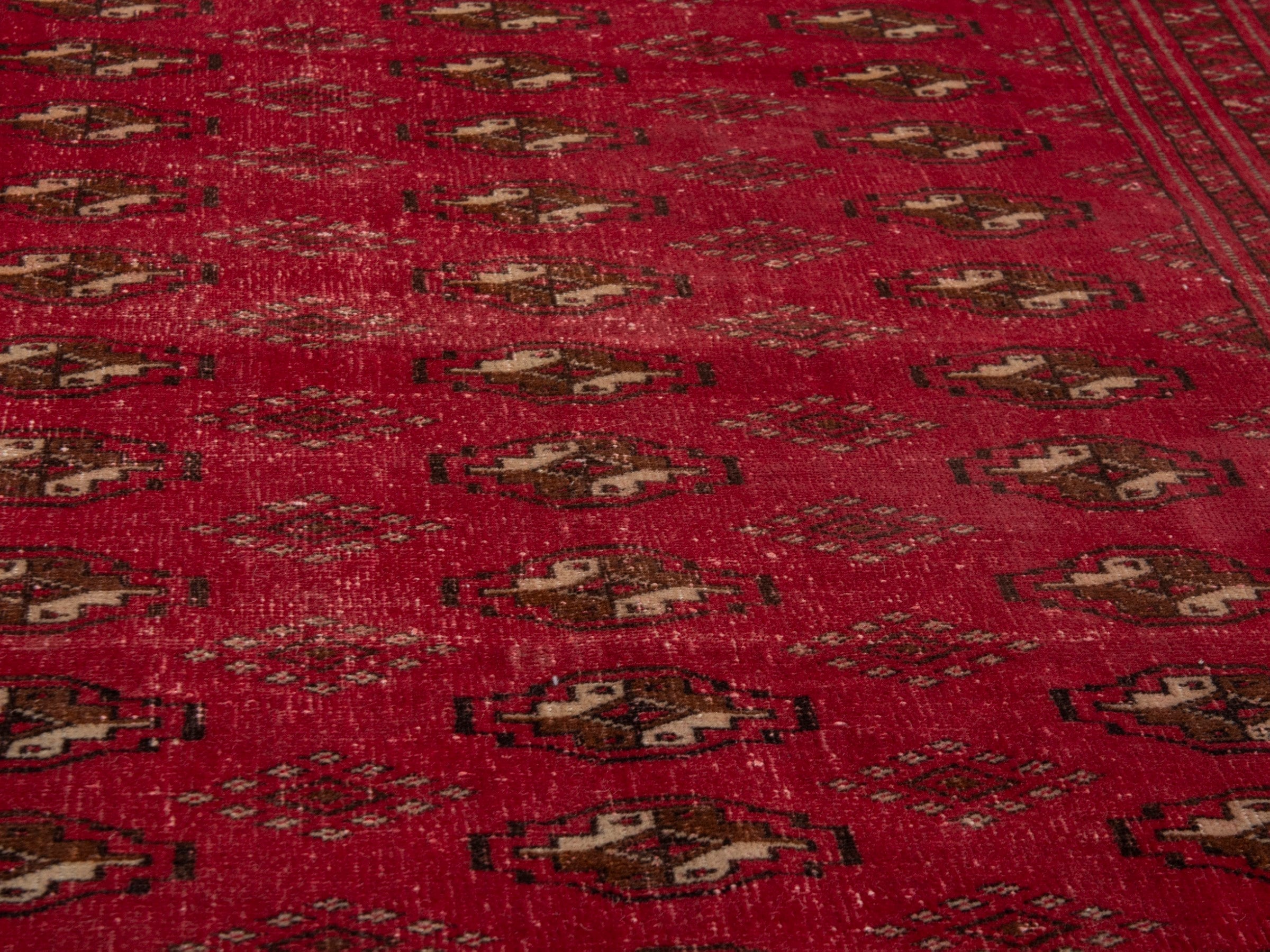 Persian Torkaman accent rug in deep red and gold, view 8 of 17