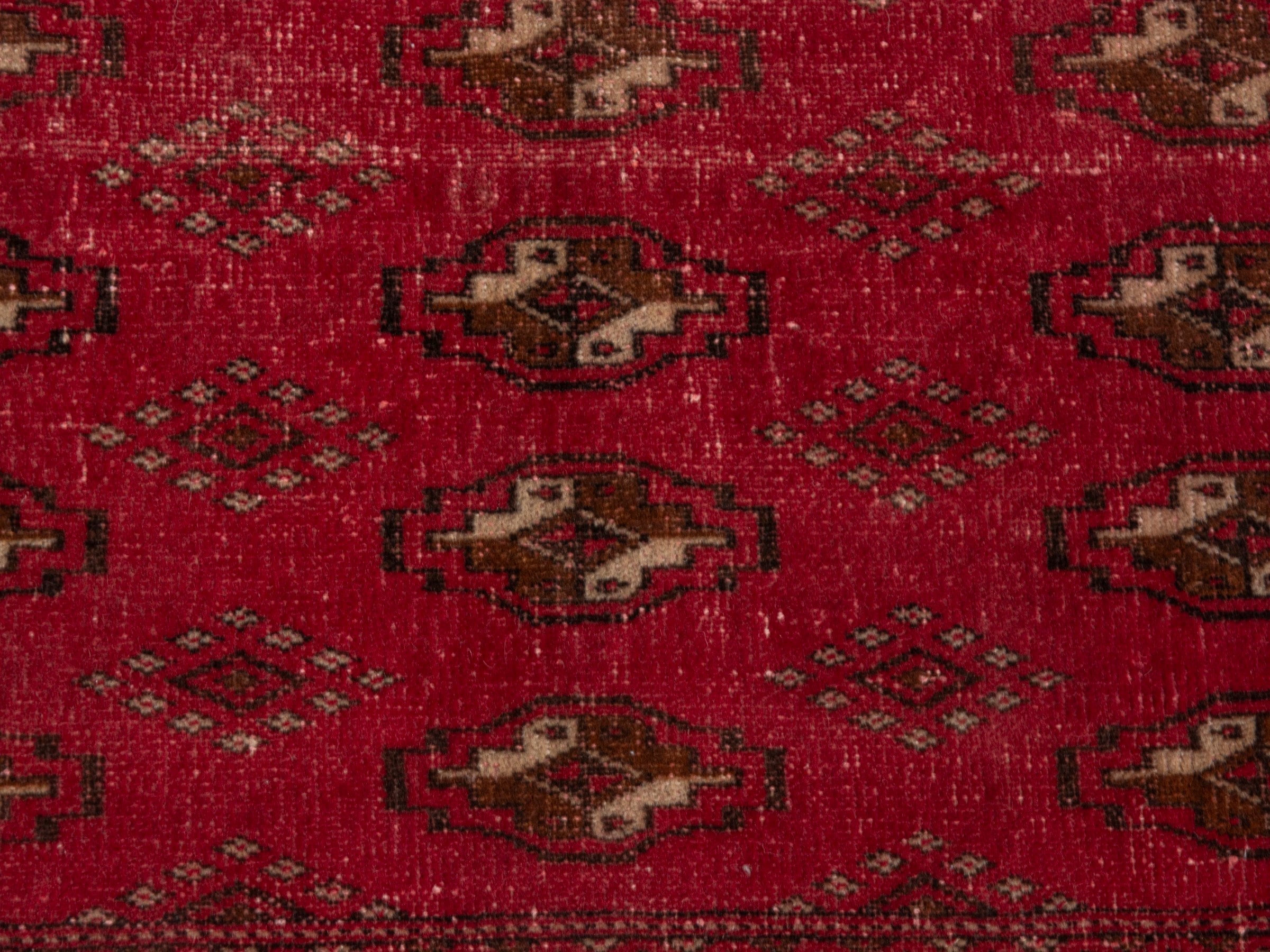 Persian Torkaman accent rug in deep red and gold, view 11 of 17