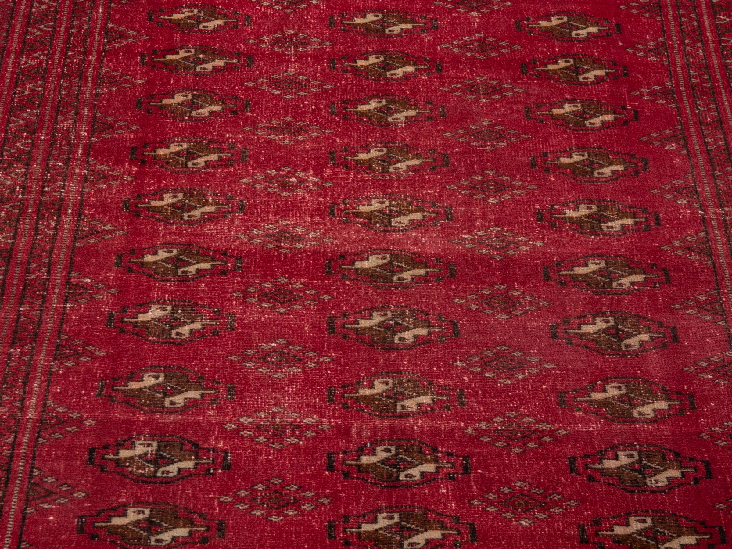 Persian Torkaman accent rug in deep red and gold, view 7 of 17