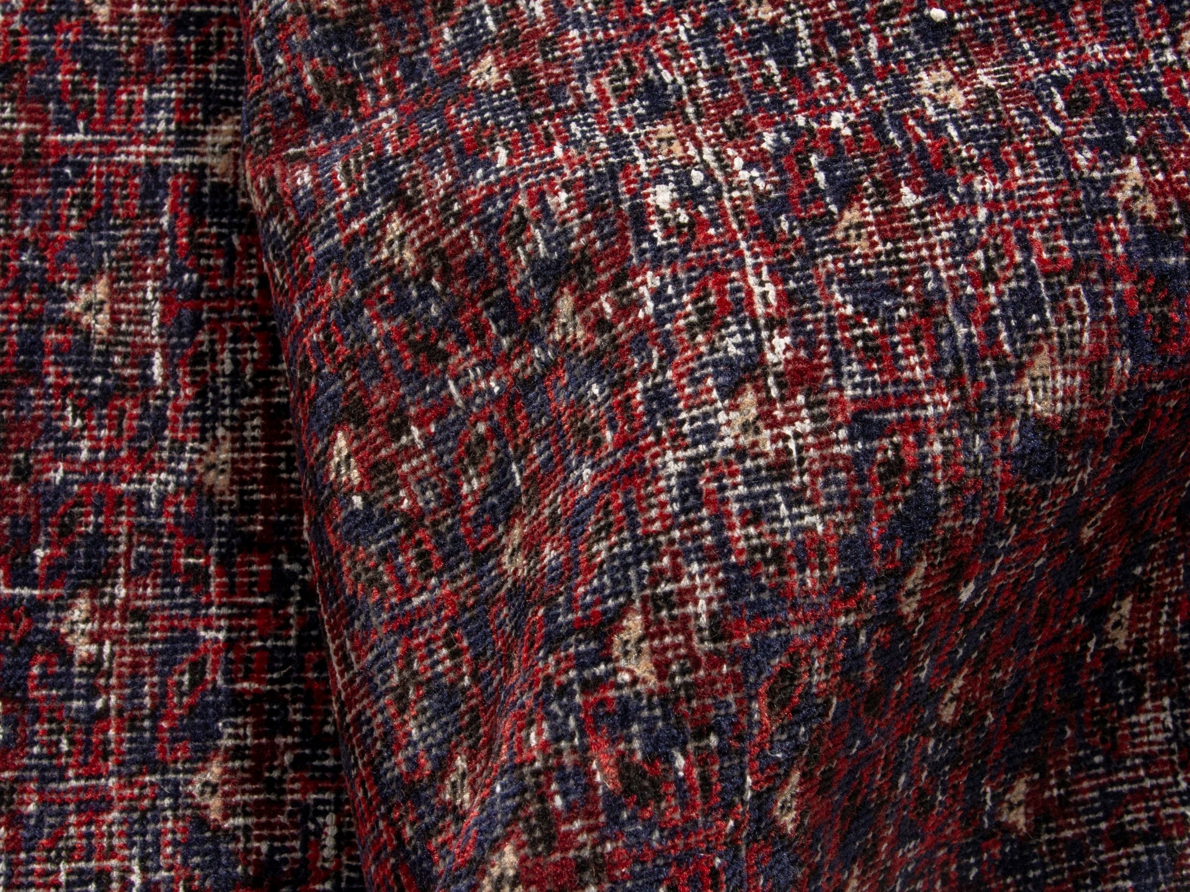 Persian Baluch accent rug in burgundy and faded red, view 15 of 17