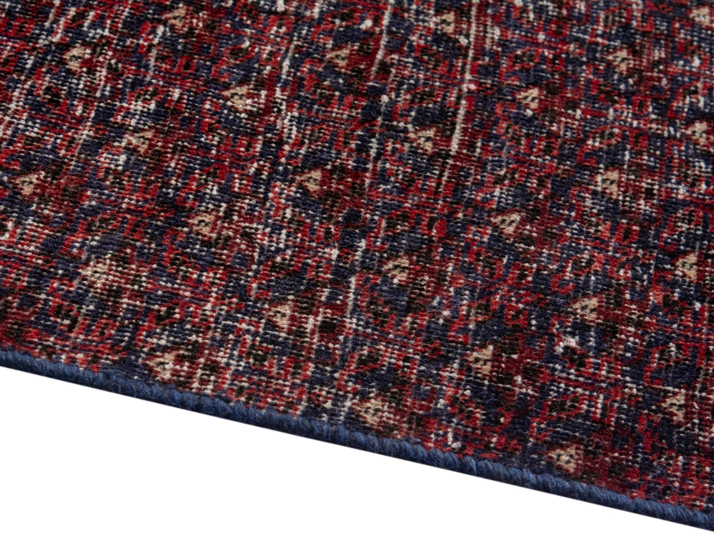 Persian Baluch accent rug in burgundy and faded red, view 6 of 17