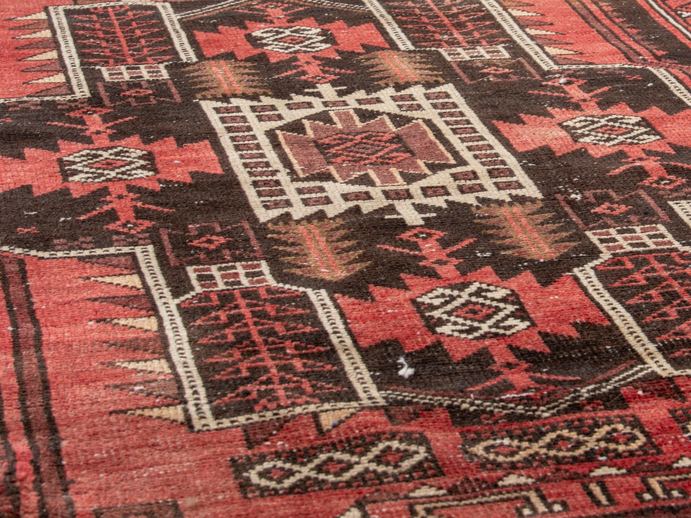 Persian Baluch runner rug in faded red and navy, view 8 of 18