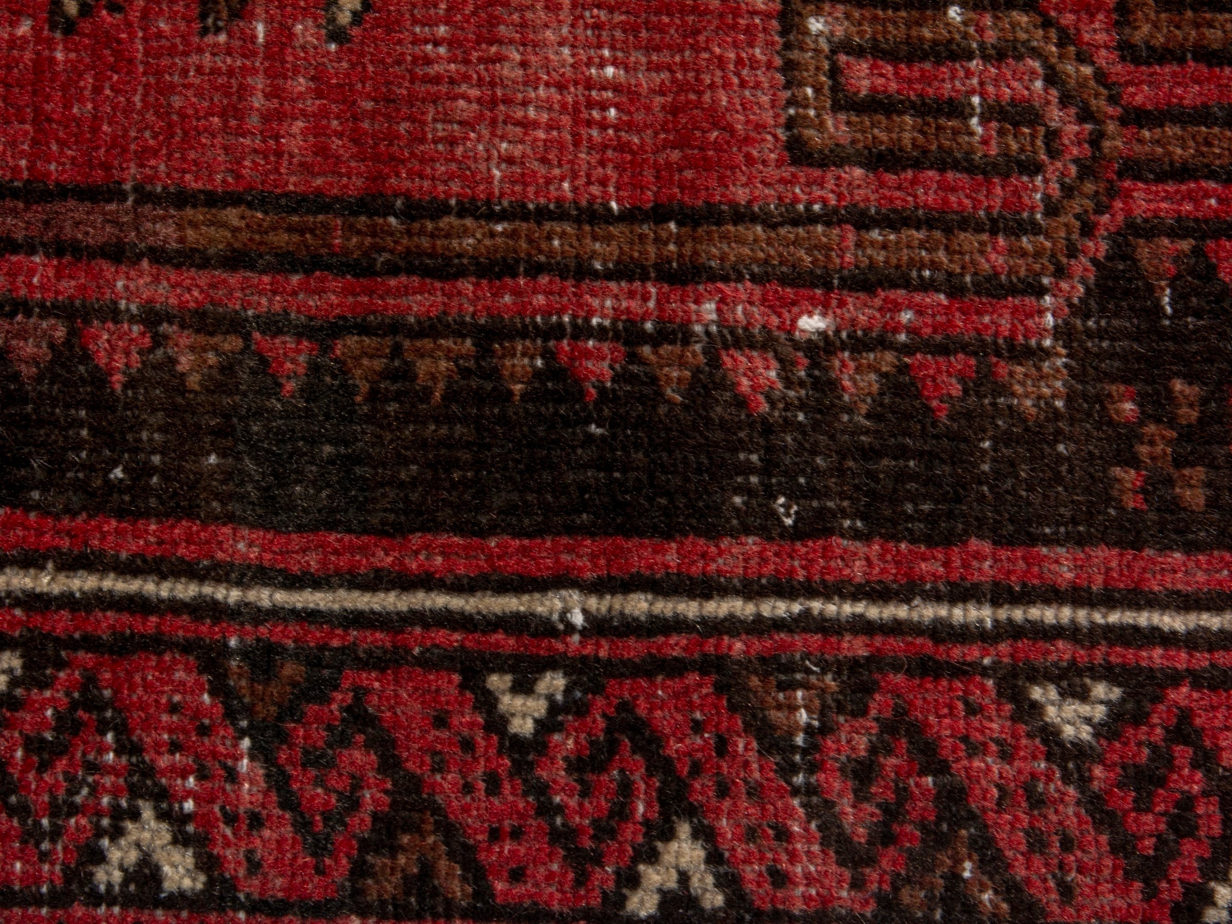 Persian Baluch runner rug in faded red and navy, view 14 of 18