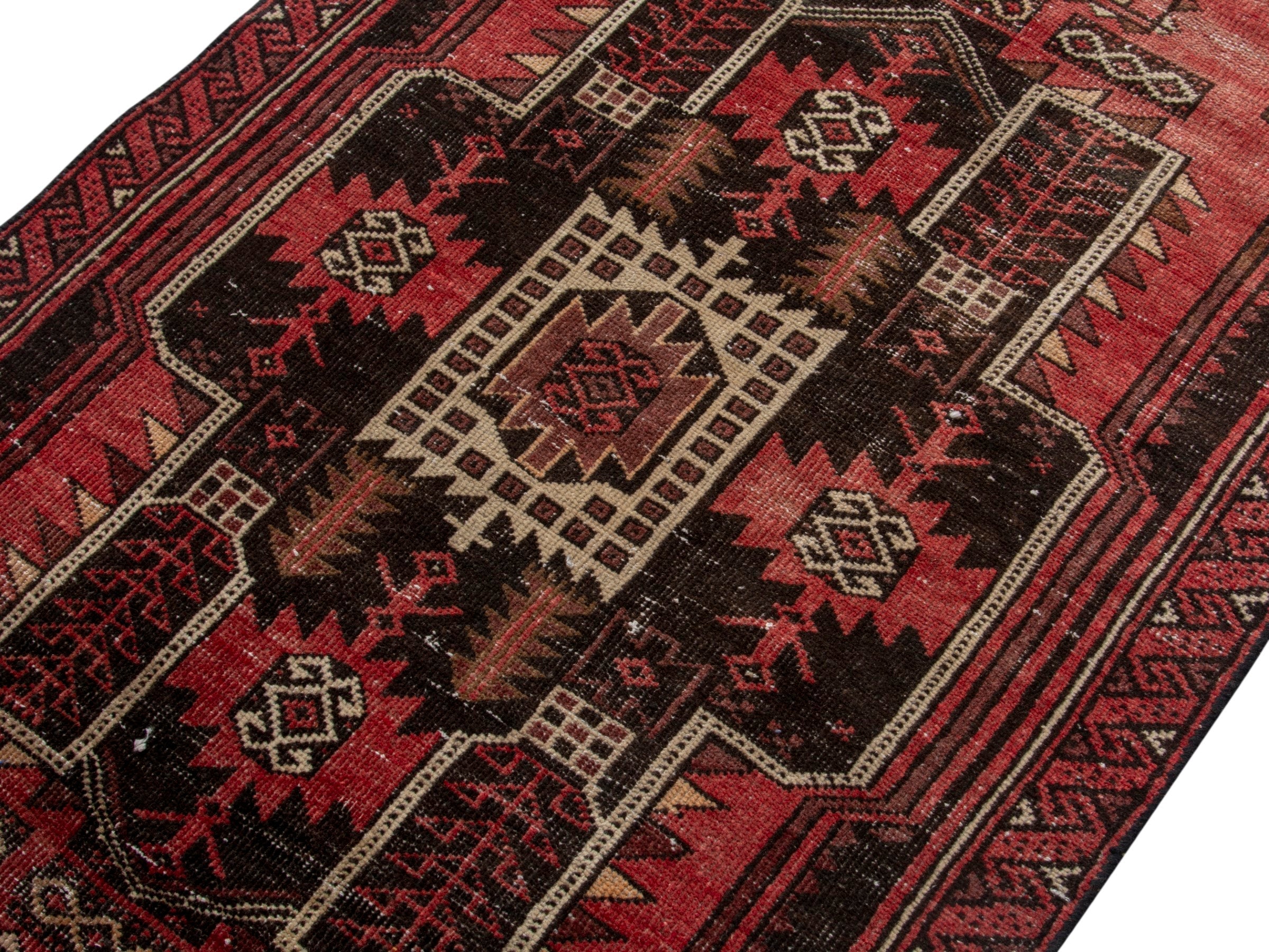 Persian Baluch runner rug in faded red and navy, view 4 of 18